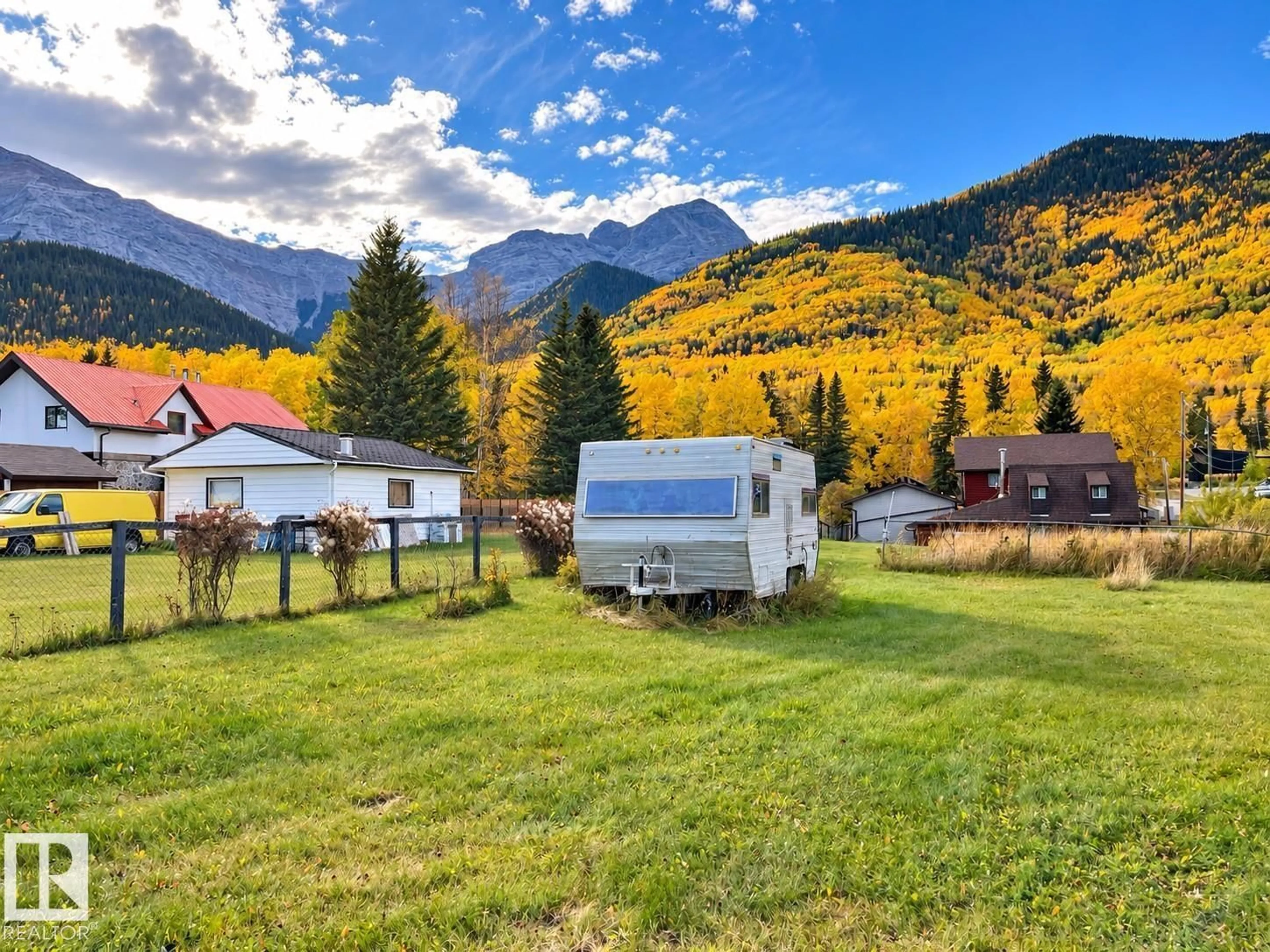 A pic from outside/outdoor area/front of a property/back of a property/a pic from drone, mountain view for 4933 CENTRE ST, Brule Alberta T7V1Z1