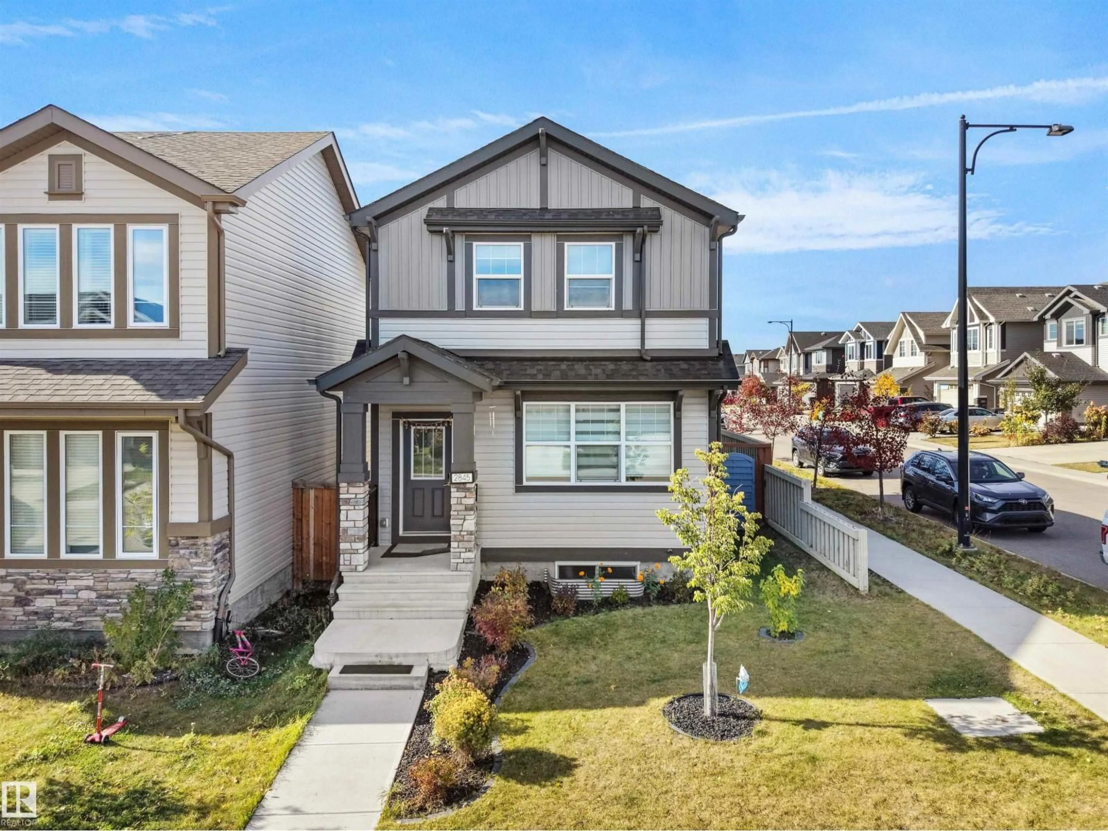 Home with vinyl exterior material, street for 2845 ANTON WD, Edmonton Alberta T6W4B1