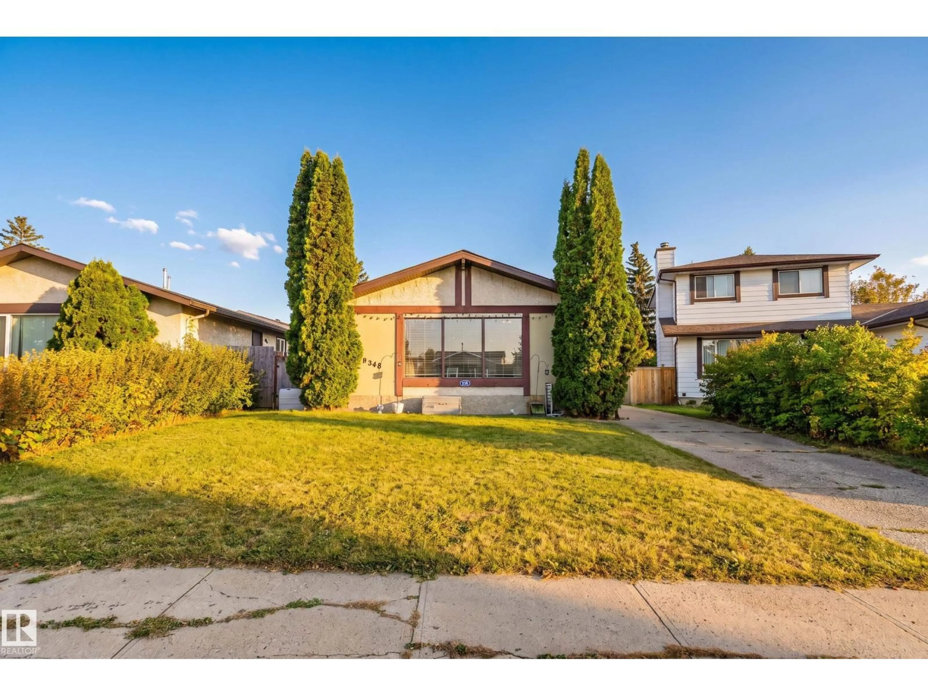 Home with vinyl exterior material, street for 3819 17A AV, Edmonton Alberta T6L2R3