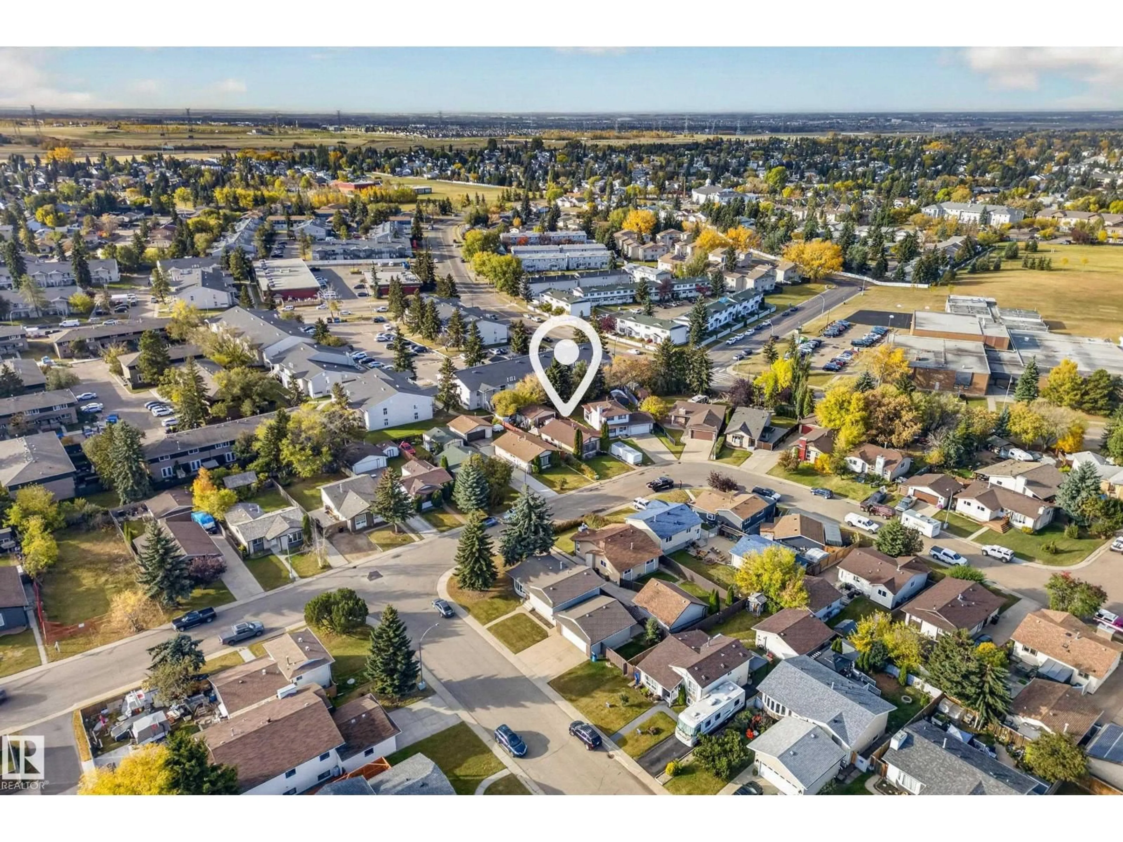 A pic from outside/outdoor area/front of a property/back of a property/a pic from drone, street for 3819 17A AV, Edmonton Alberta T6L2R3
