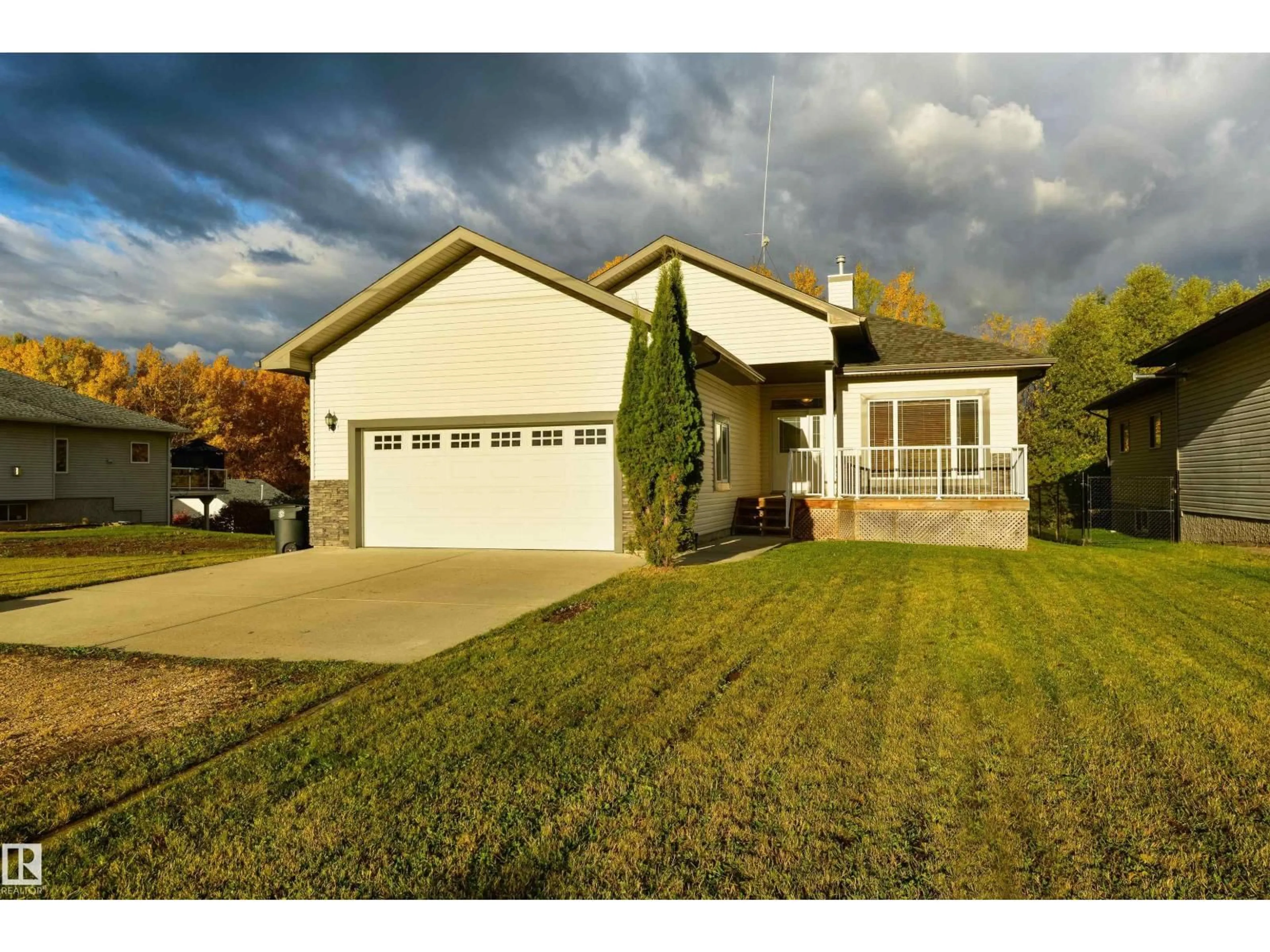 Home with vinyl exterior material, street for 4324 43 AV, Rural Lac Ste. Anne County Alberta T0E0A0