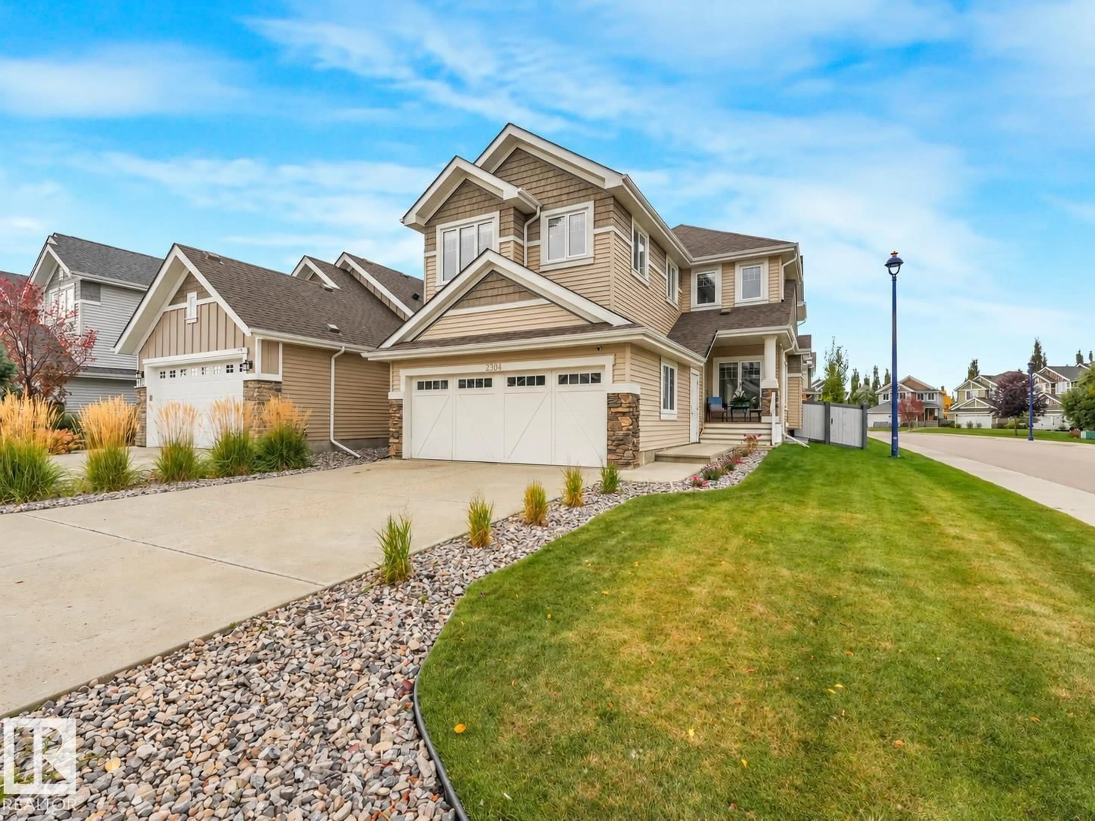 Home with vinyl exterior material, street for SW - 2304 89 ST, Edmonton Alberta T6X2C3