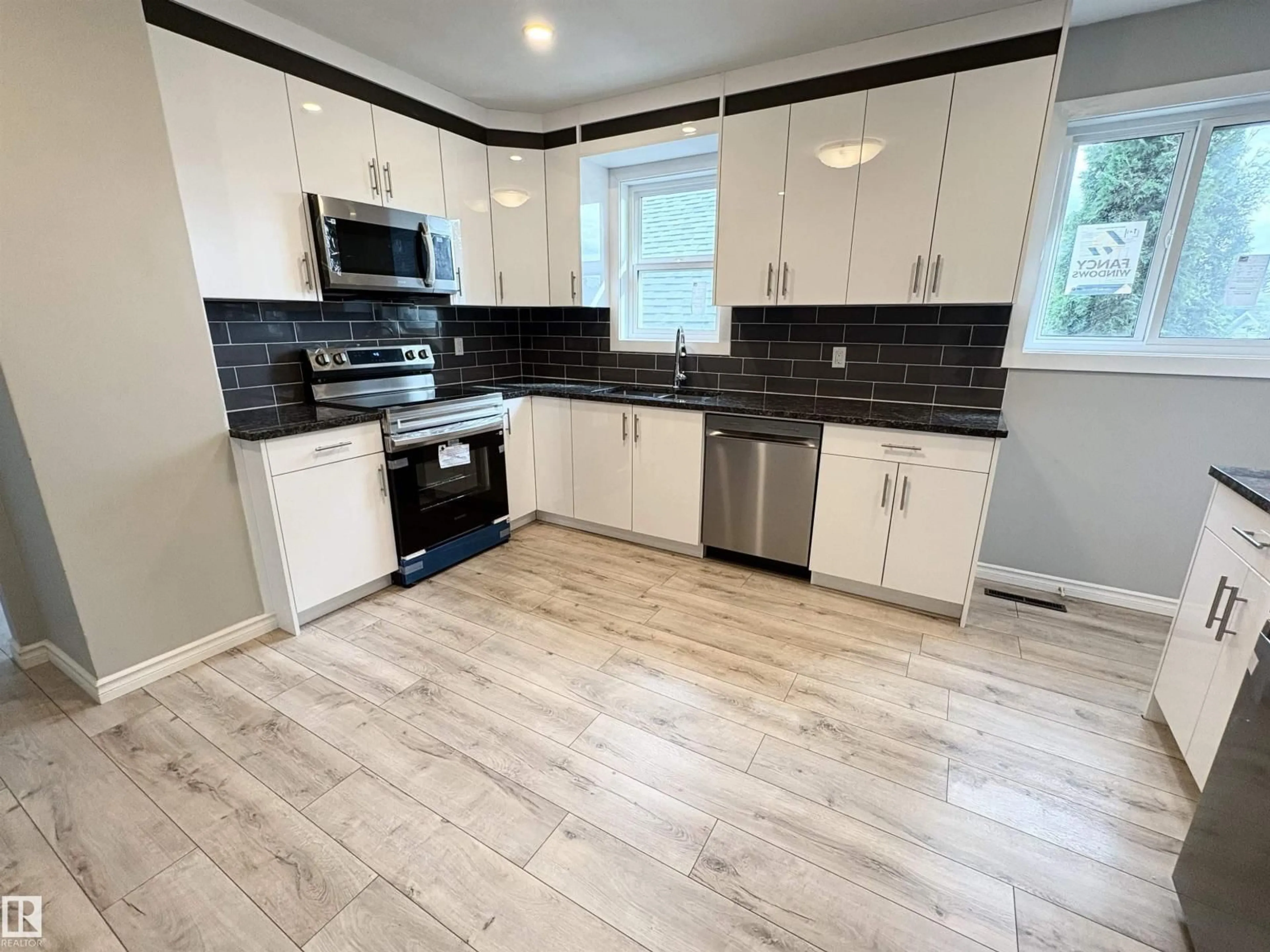 Open concept kitchen, unknown for 12764 118 ST, Edmonton Alberta T5E5K8