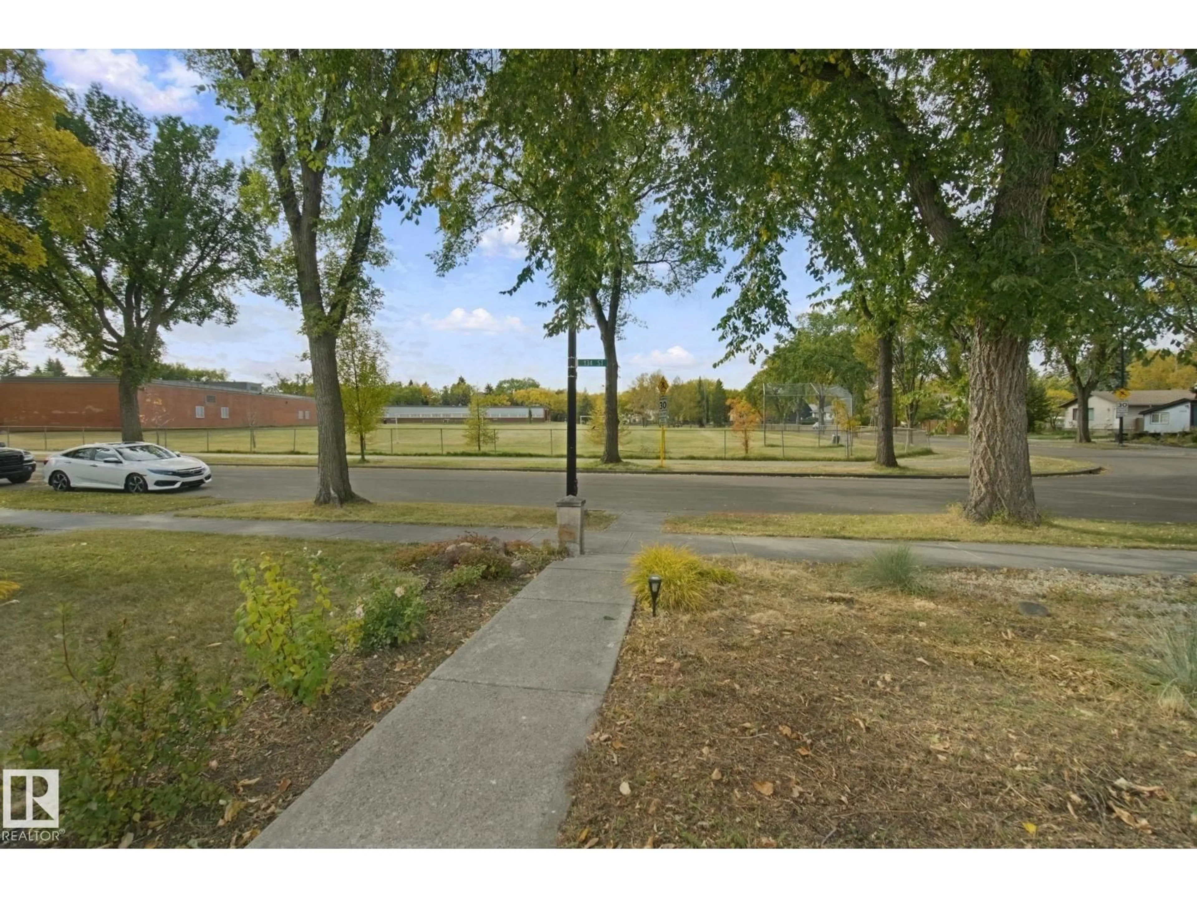 A pic from outside/outdoor area/front of a property/back of a property/a pic from drone, street for NW - 11639 134 ST, Edmonton Alberta T5M1J3