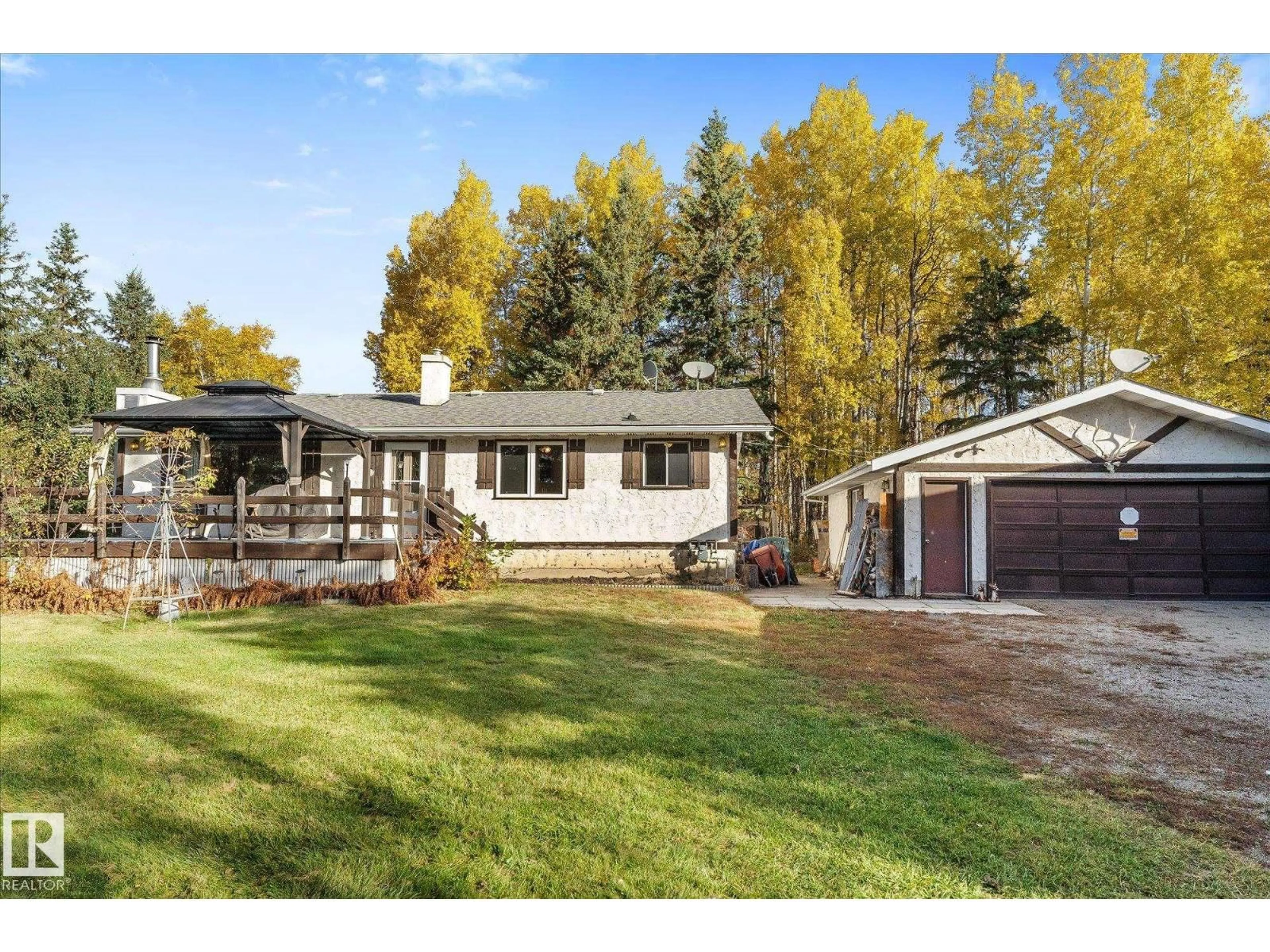 Home with vinyl exterior material, street for 68 RGE ROAD 264, Rural Parkland County Alberta T7Y1E5