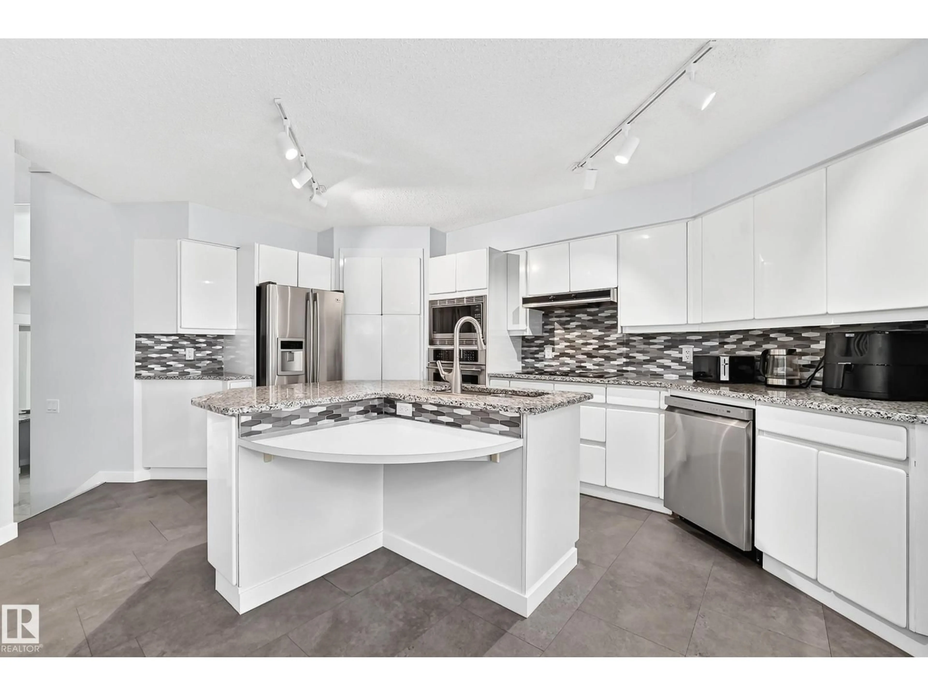 Open concept kitchen, ceramic/tile floor for 5830 181 ST, Edmonton Alberta T6M1V6
