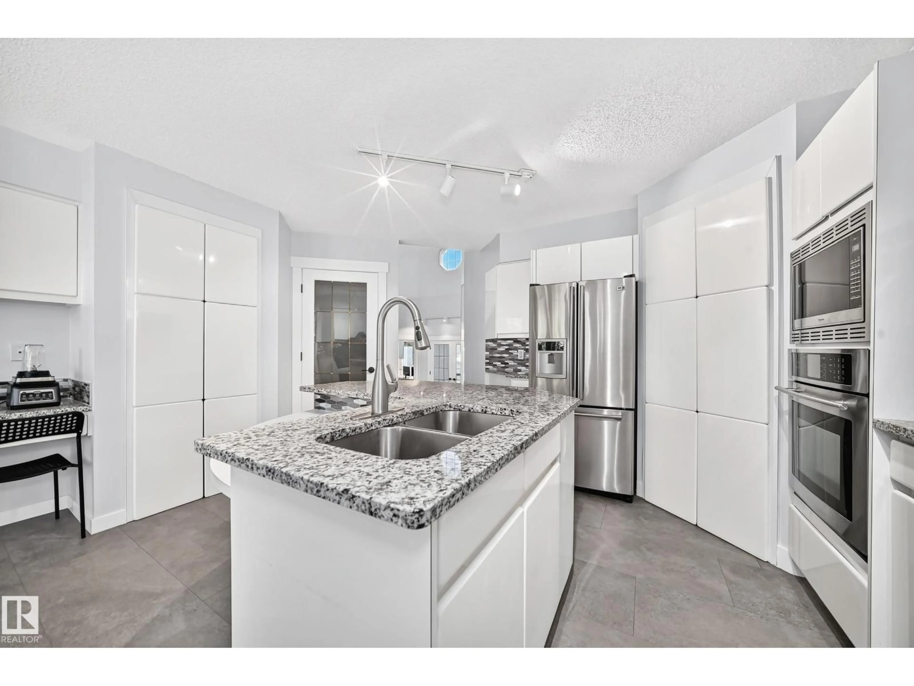 Open concept kitchen, ceramic/tile floor for 5830 181 ST, Edmonton Alberta T6M1V6