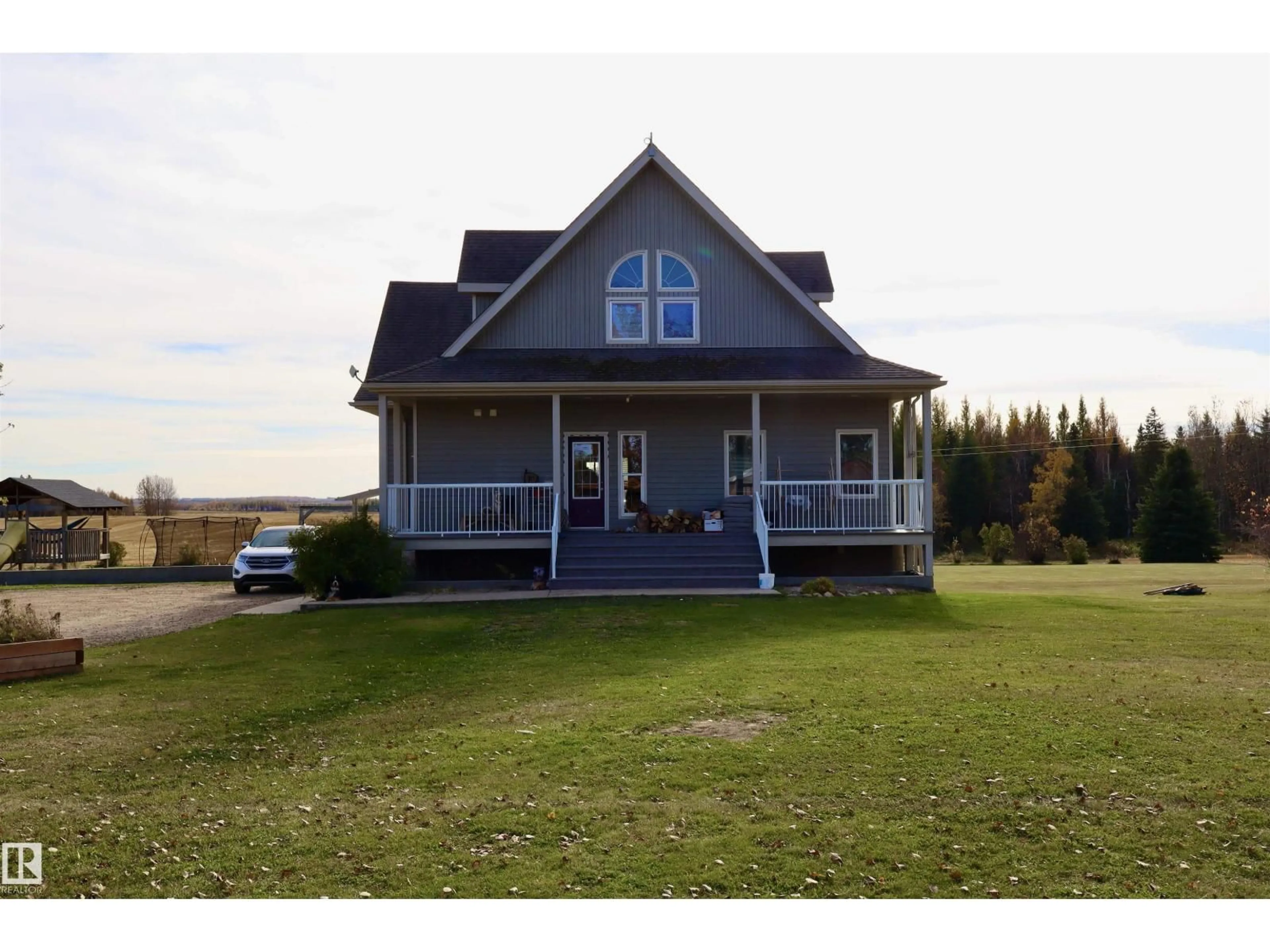 A pic from outside/outdoor area/front of a property/back of a property/a pic from drone, water/lake/river/ocean view for 3513 TWP. RD. 613A, Rural Barrhead County Alberta T7N1N2