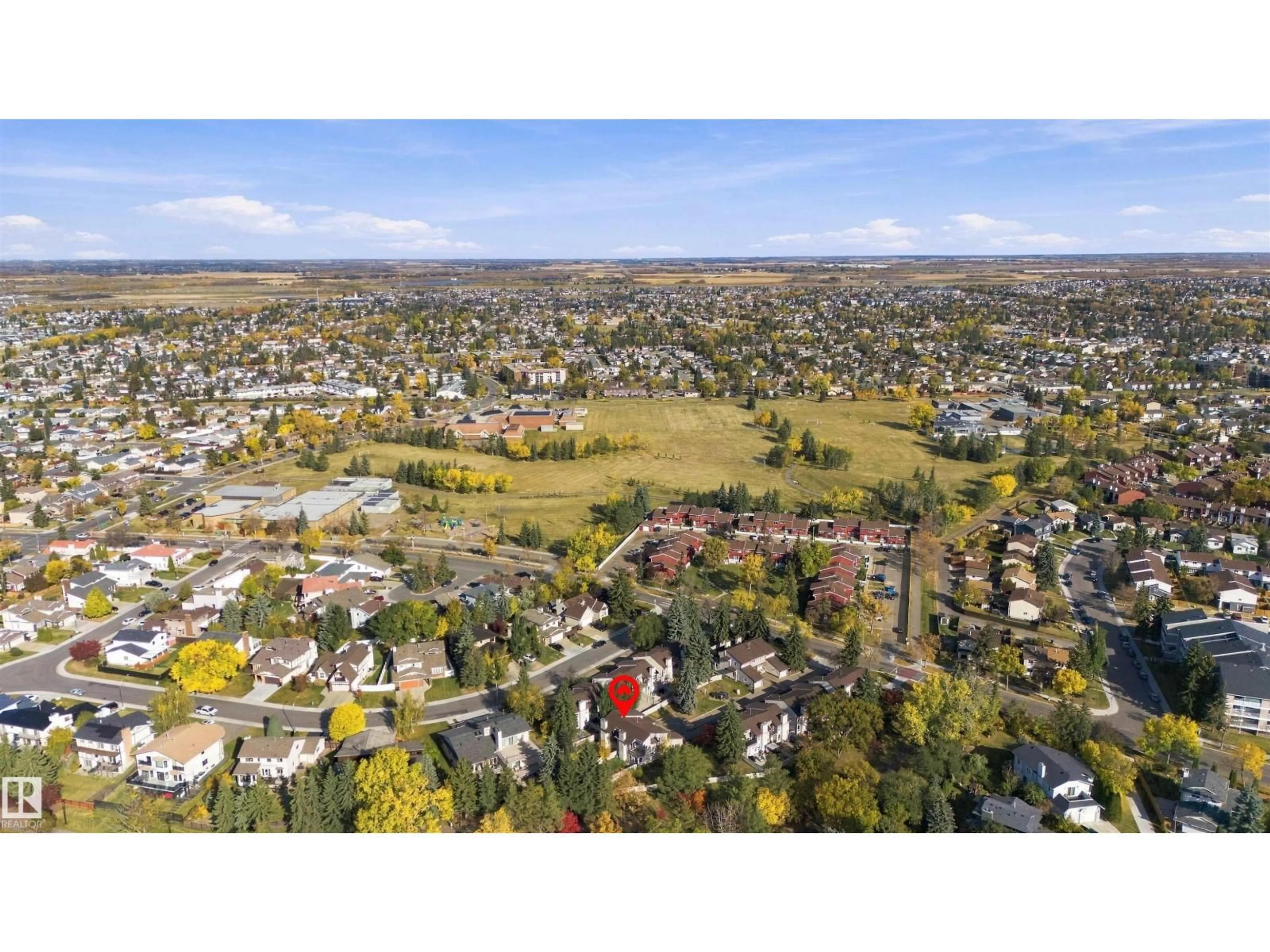 A pic from outside/outdoor area/front of a property/back of a property/a pic from drone, mountain view for 10619 BEAUMARIS RD, Edmonton Alberta T5X5J5