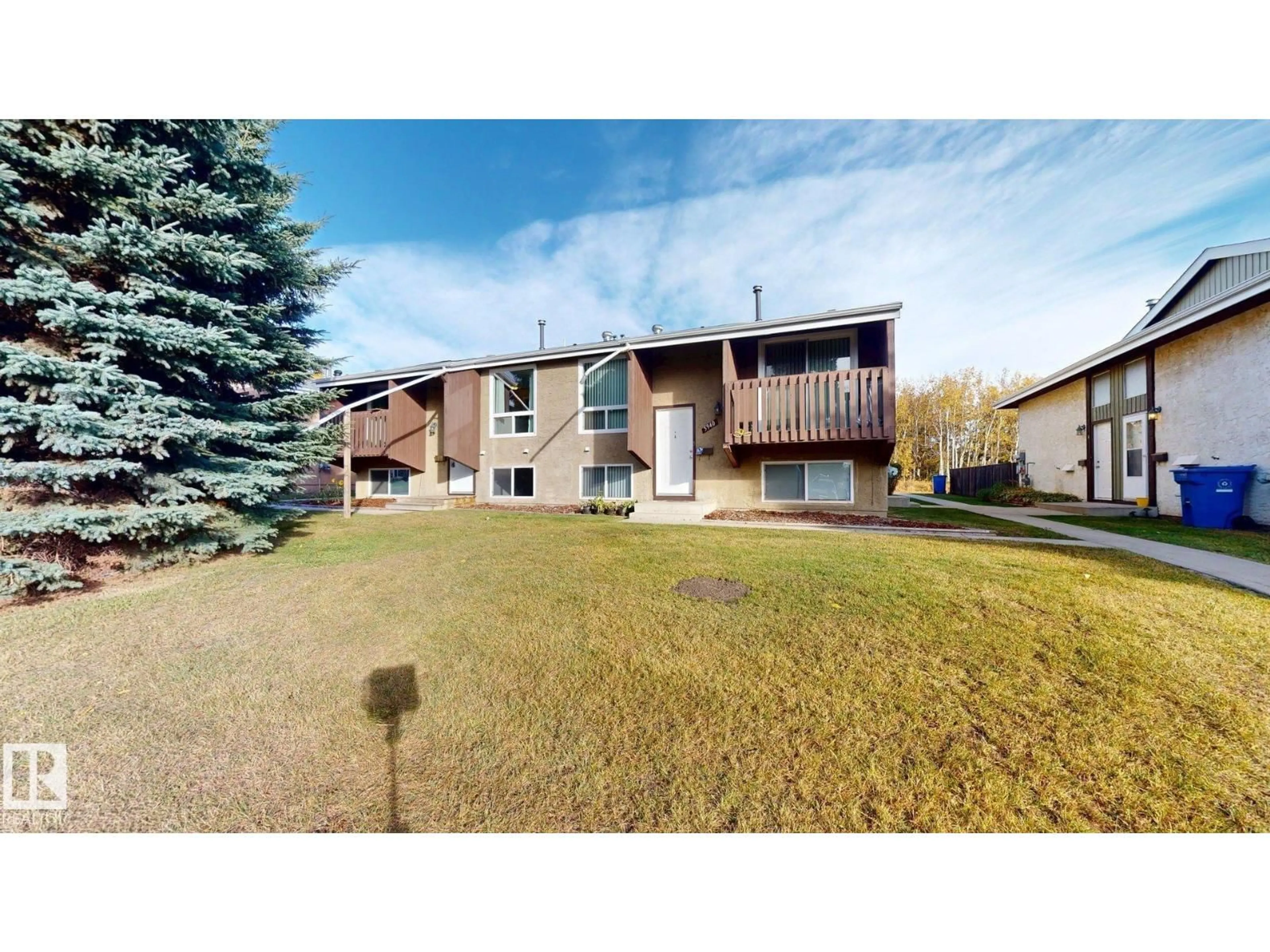 A pic from outside/outdoor area/front of a property/back of a property/a pic from drone, street for A - 5940 45 AV, Lacombe Alberta T4L1V7