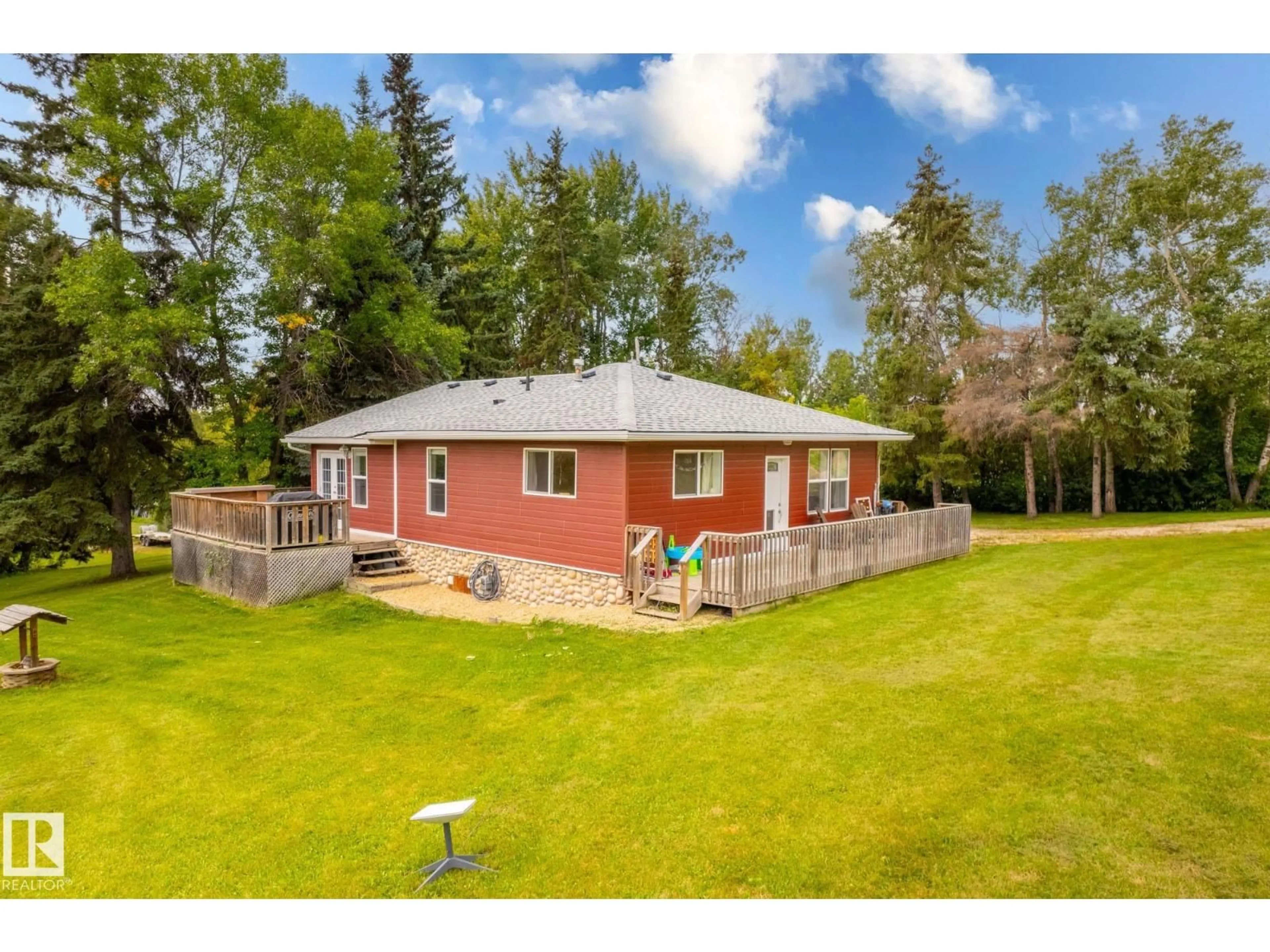 A pic from outside/outdoor area/front of a property/back of a property/a pic from drone, water/lake/river/ocean view for 55115 RGE ROAD 13, Rural Lac Ste. Anne County Alberta T0E1V0