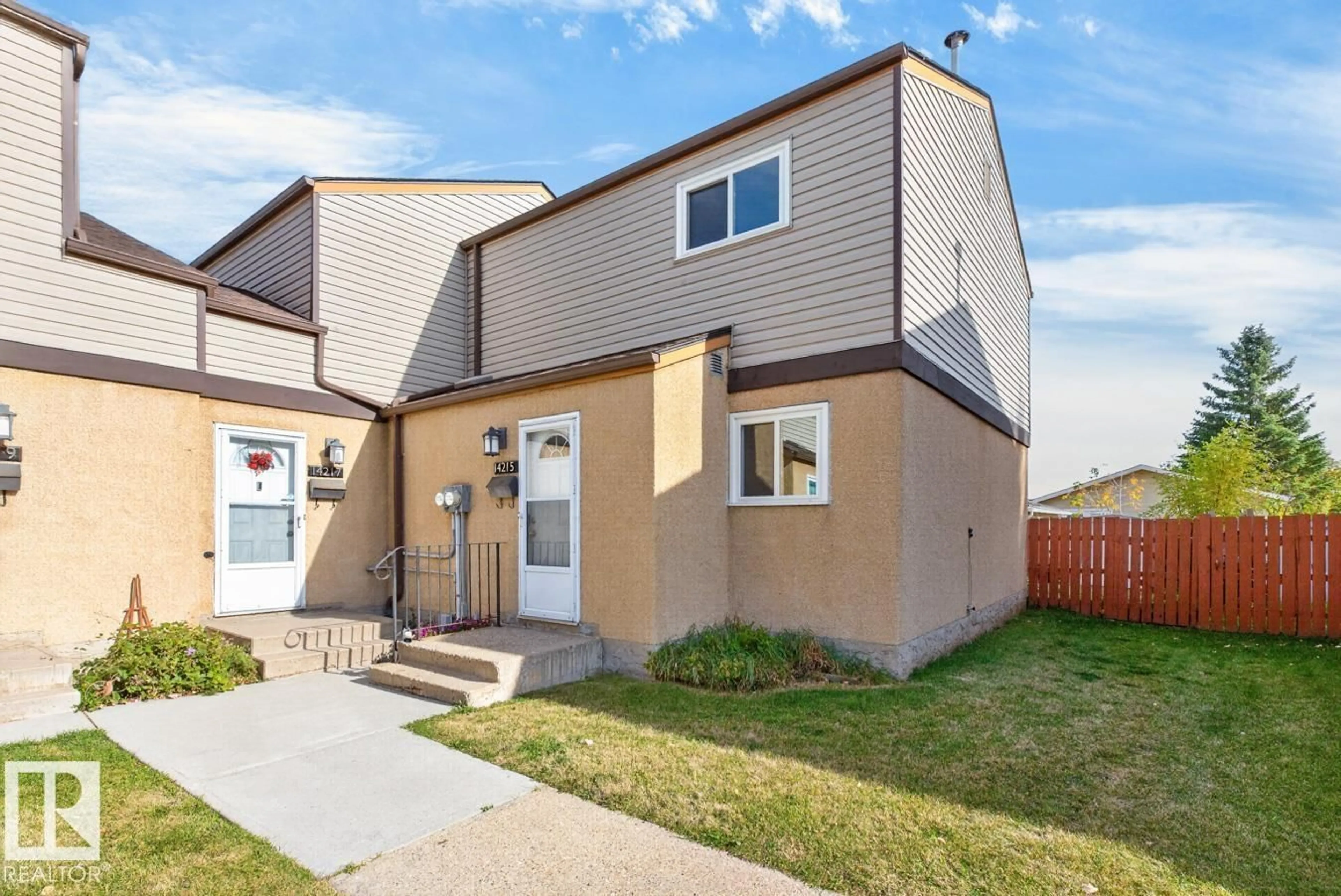 Home with vinyl exterior material, street for 14215 23 ST, Edmonton Alberta T5Y1N1