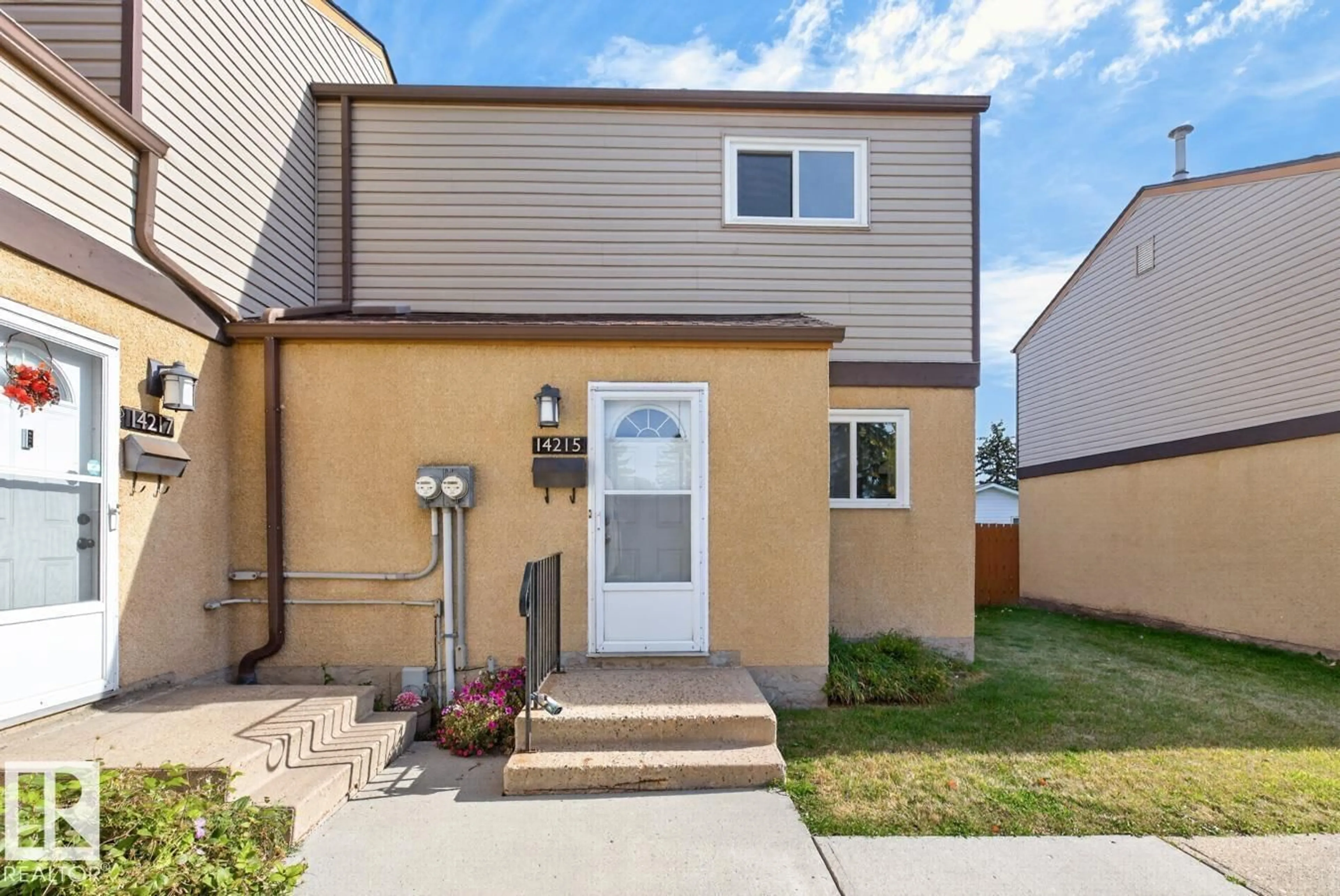 Home with vinyl exterior material, street for 14215 23 ST, Edmonton Alberta T5Y1N1