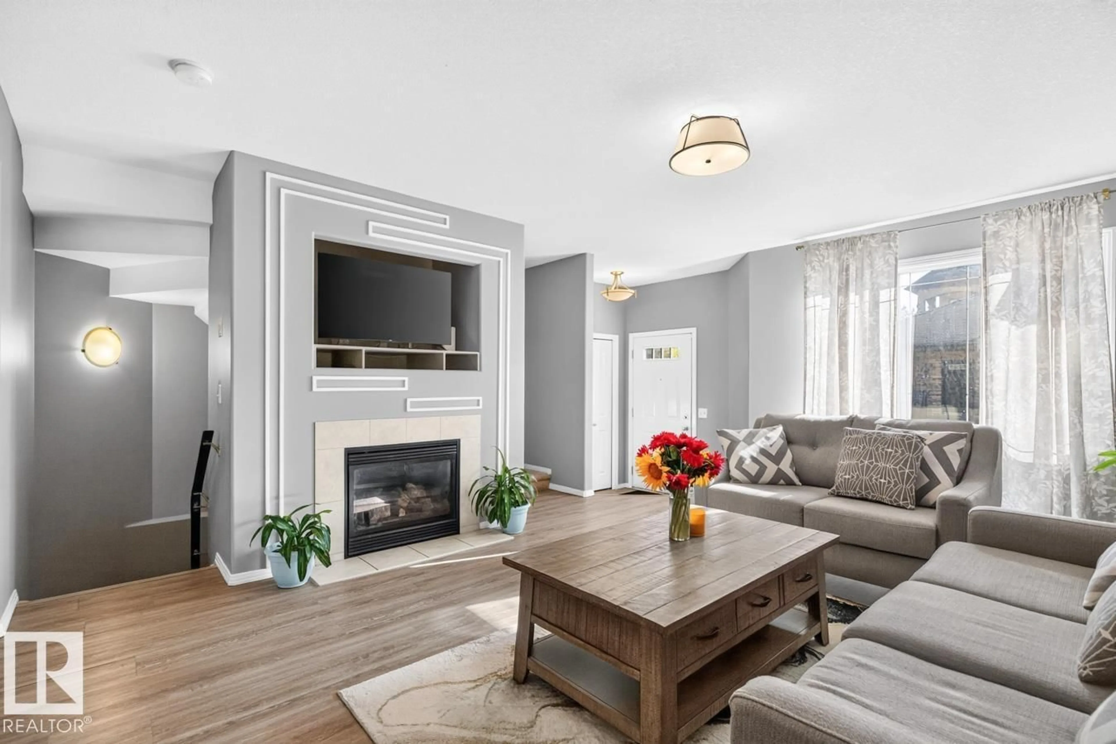 Living room with furniture, unknown for #11 - 12930 140 AV NW, Edmonton Alberta T6V0C4