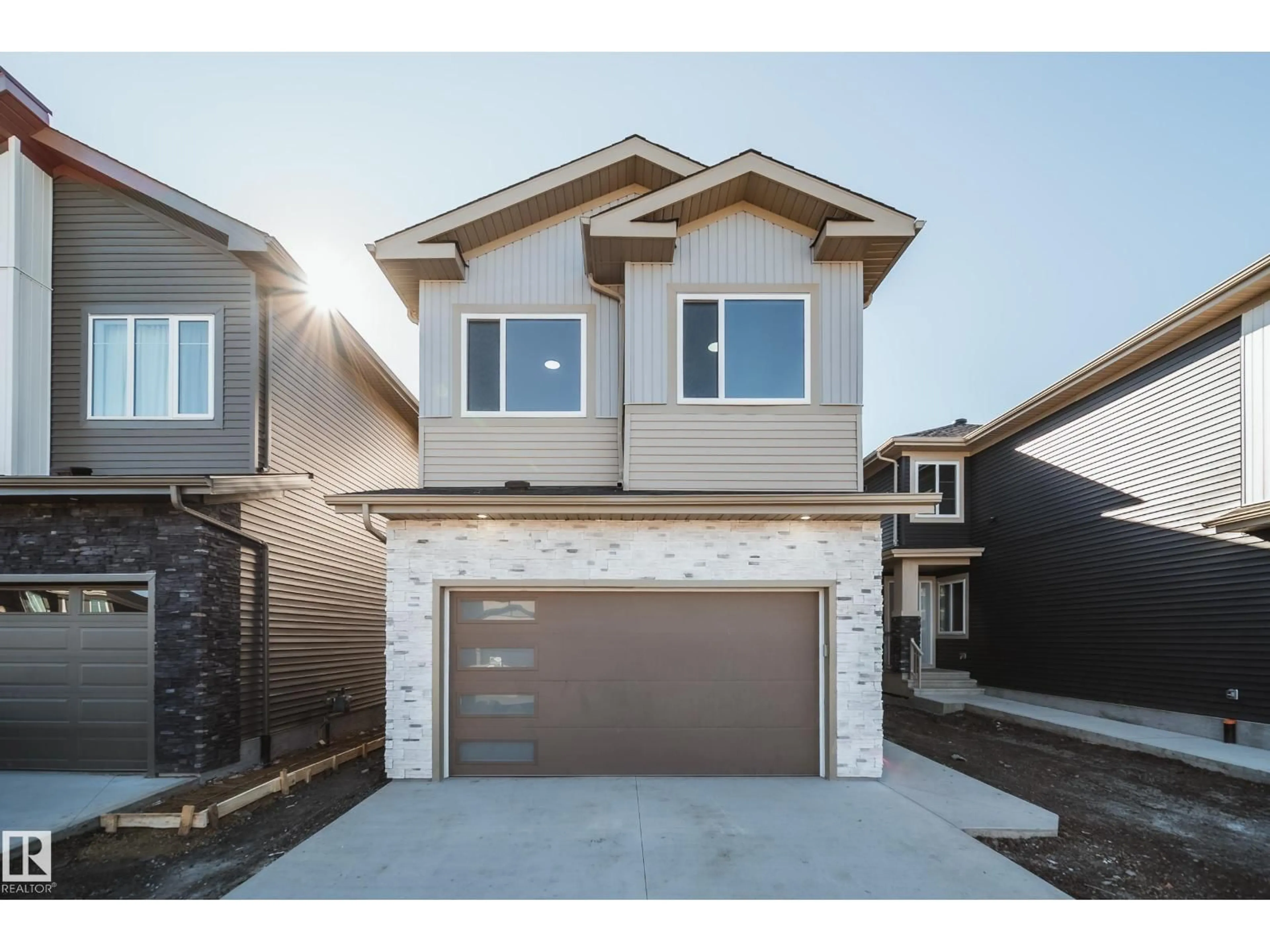 Home with vinyl exterior material, street for 8523 183 AV, Edmonton Alberta T5Z0G6