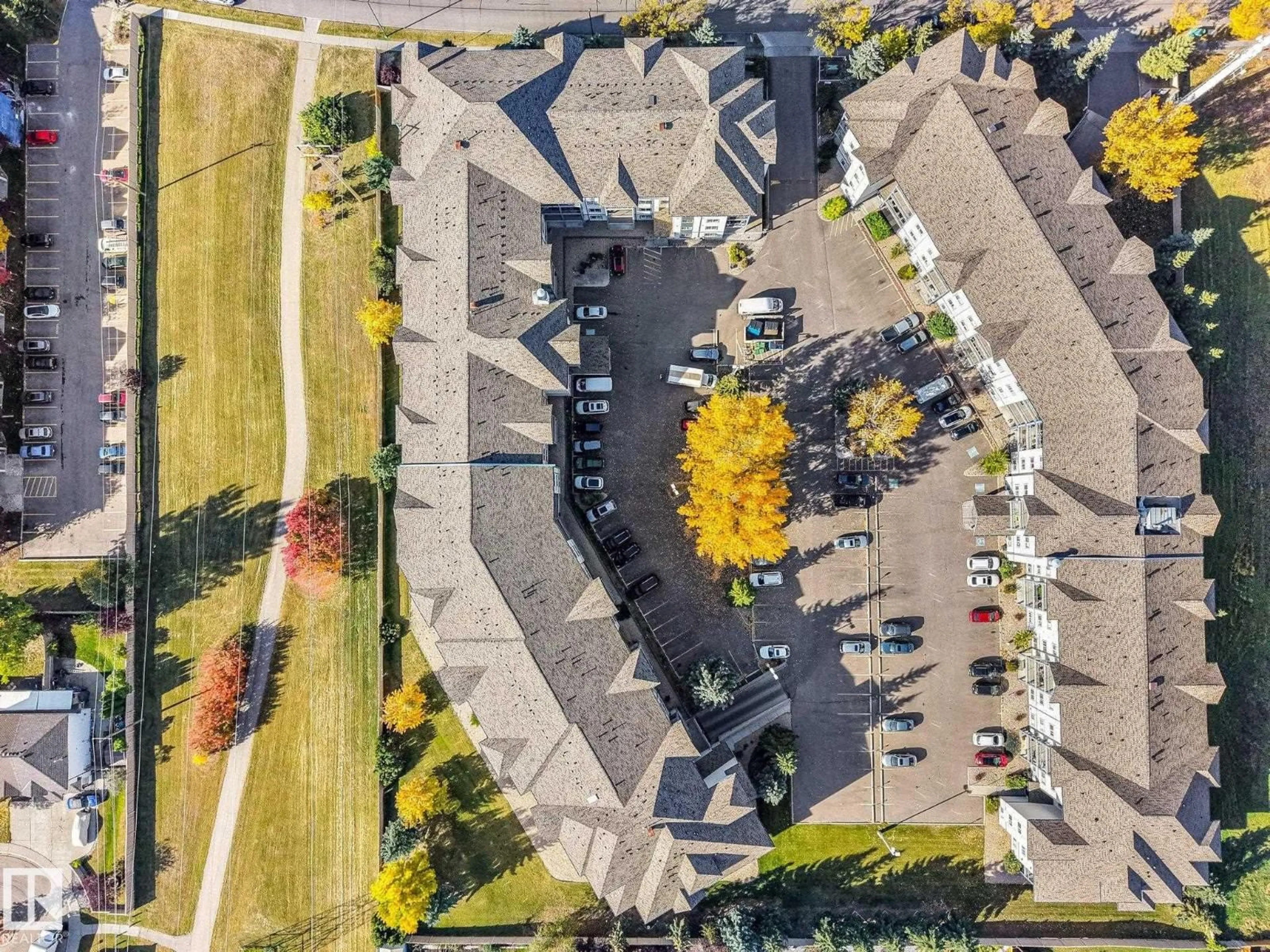 A pic from outside/outdoor area/front of a property/back of a property/a pic from drone, street for 204 - 16303 95 ST, Edmonton Alberta T5Z3V1