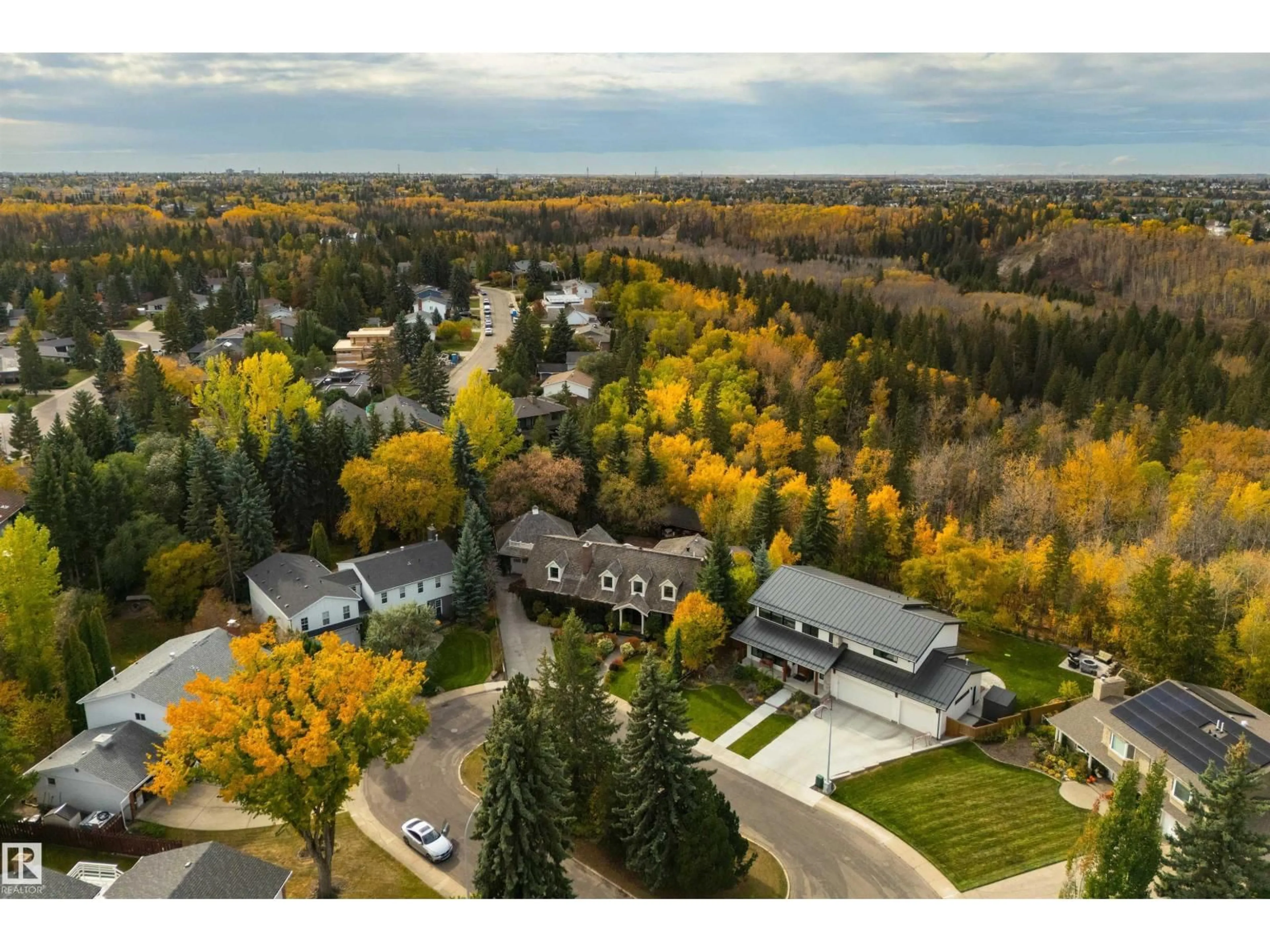 A pic from outside/outdoor area/front of a property/back of a property/a pic from drone, mountain view for 12719 39 AV, Edmonton Alberta T6J0N3