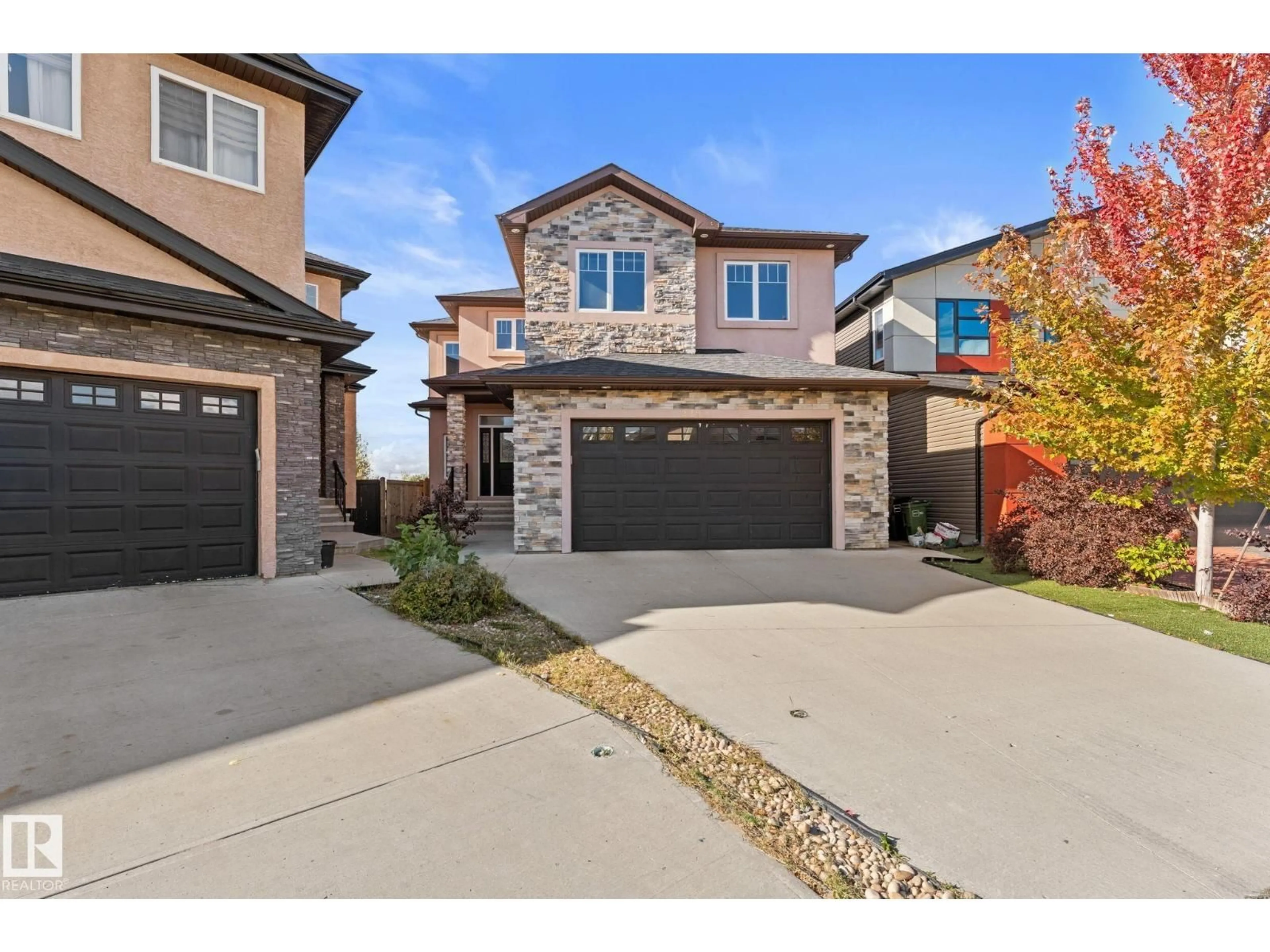 Home with brick exterior material, street for 229 ALBANY DR, Edmonton Alberta T6V0L4
