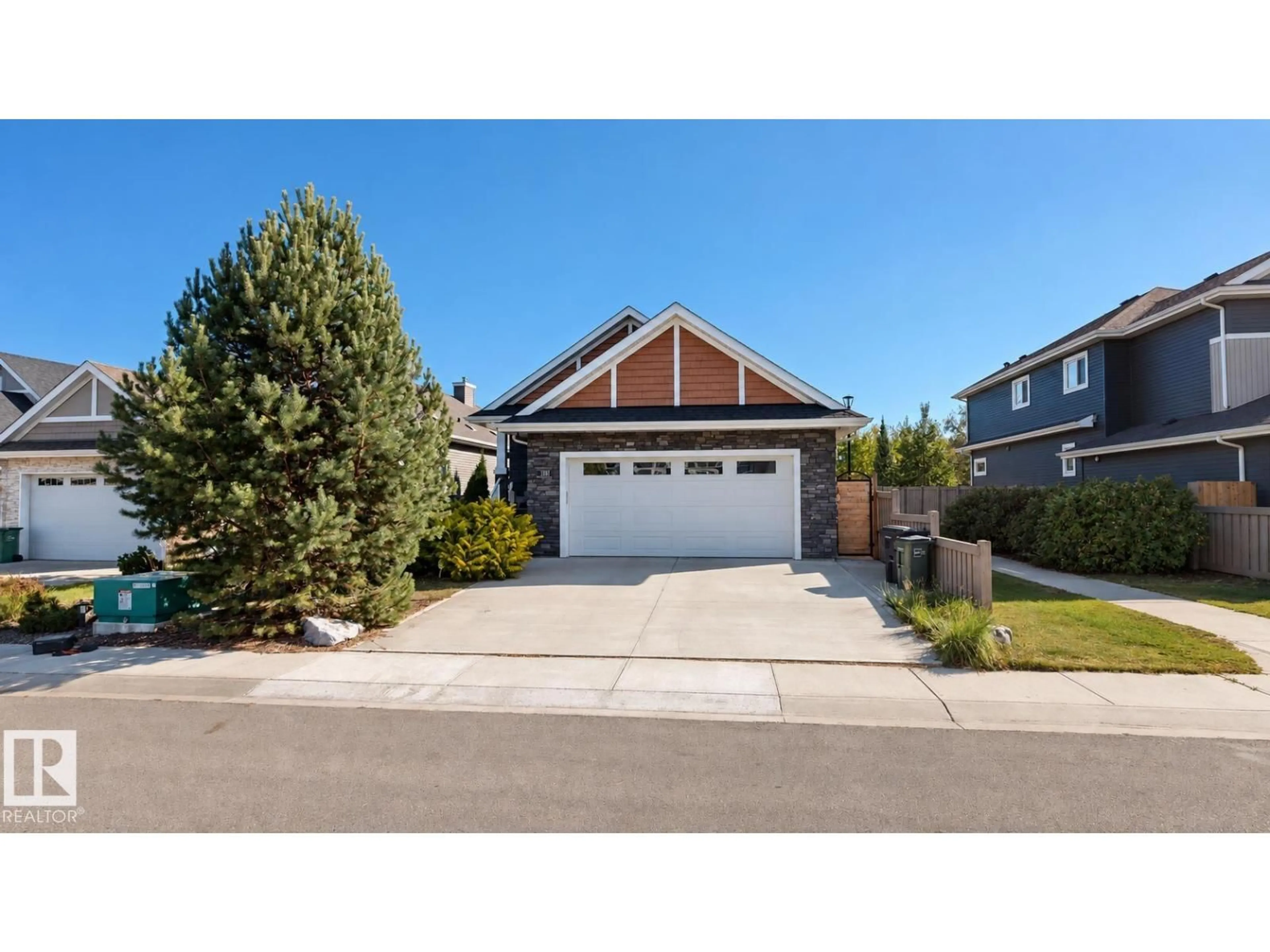 Home with vinyl exterior material, street for 3381 CHICKADEE DR, Edmonton Alberta T5S0K9