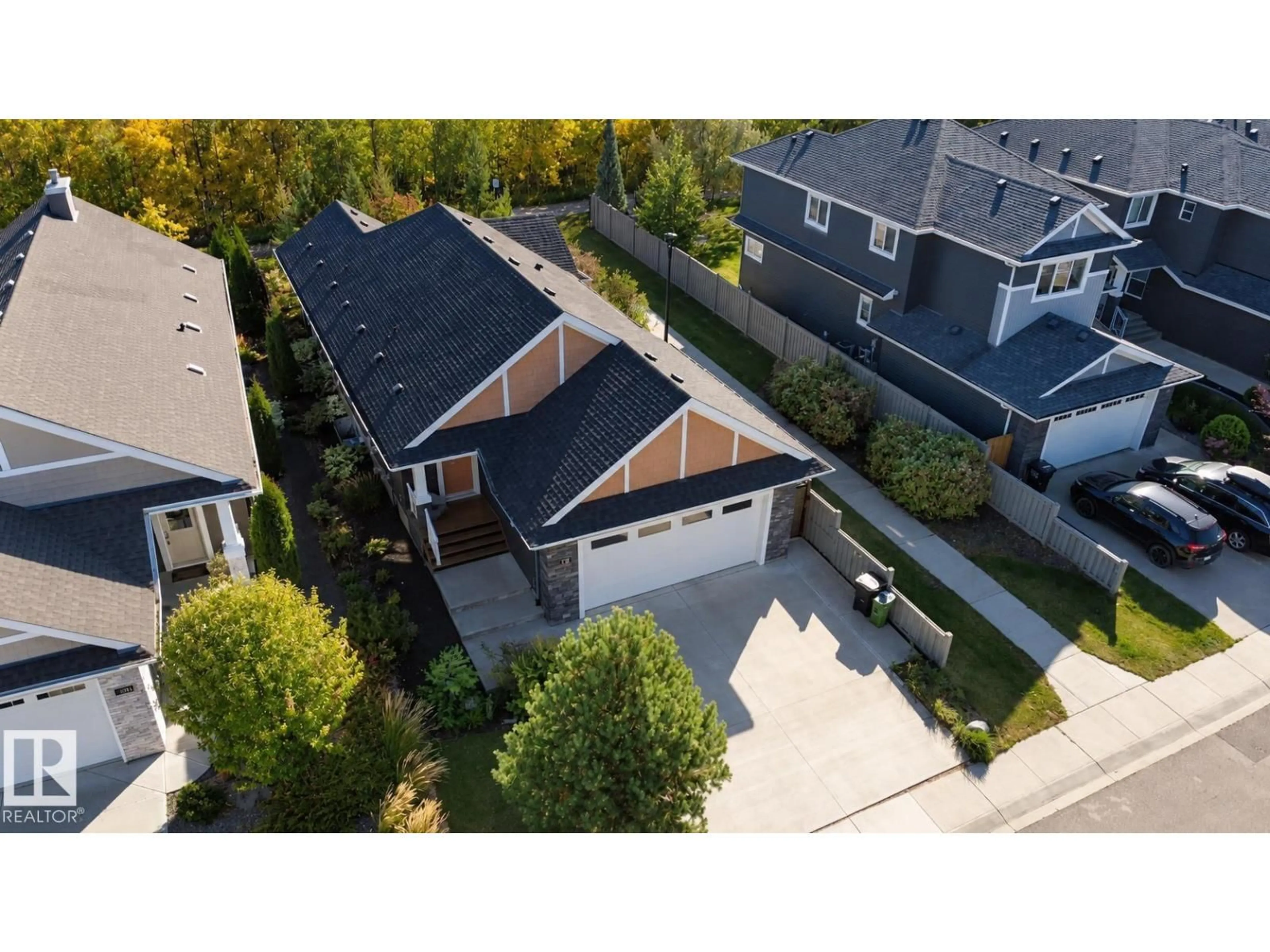 A pic from outside/outdoor area/front of a property/back of a property/a pic from drone, street for 3381 CHICKADEE DR, Edmonton Alberta T5S0K9