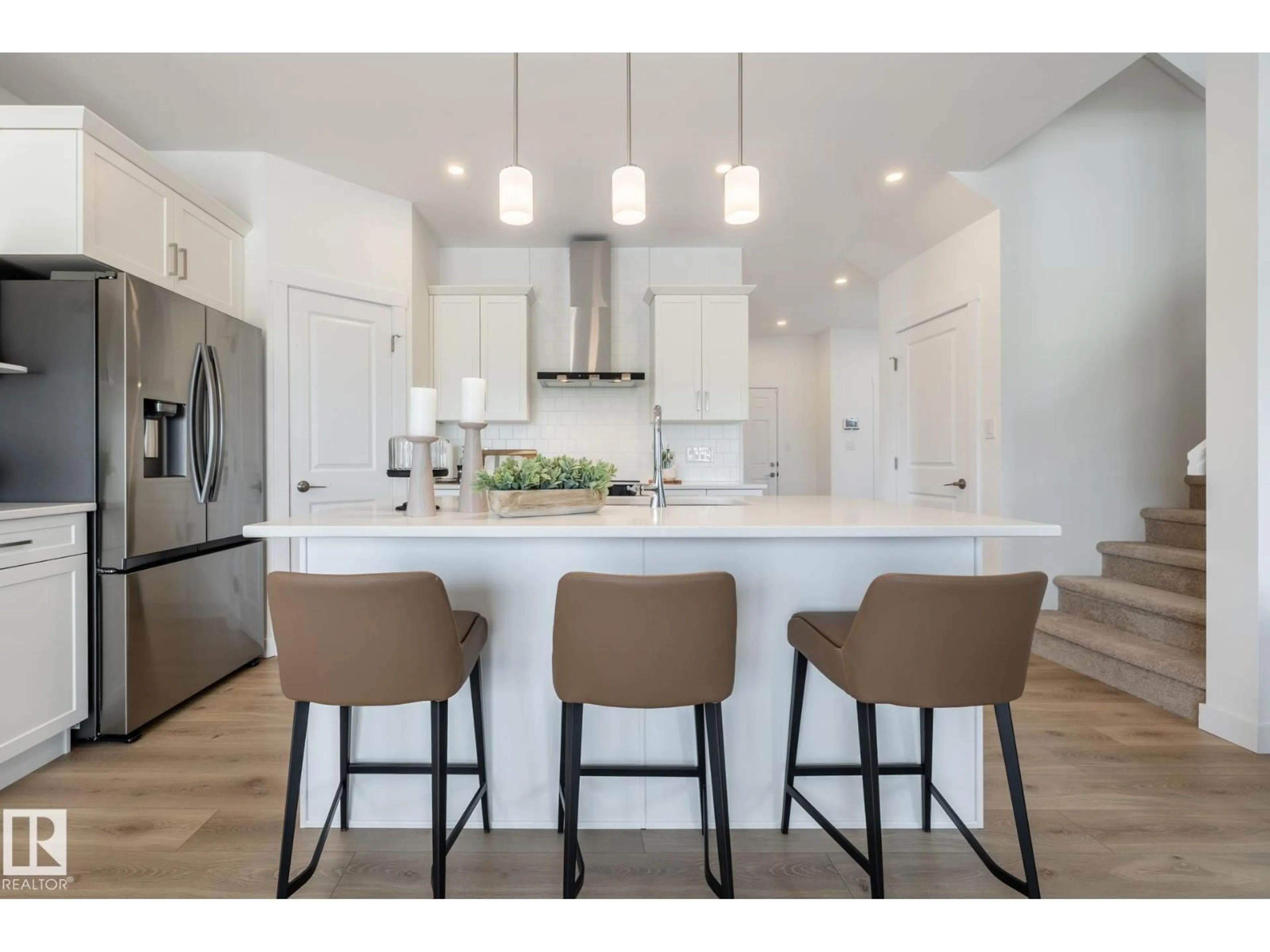 Open concept kitchen, wood/laminate floor for NE - 307 158 AV, Edmonton Alberta T5Y4M5
