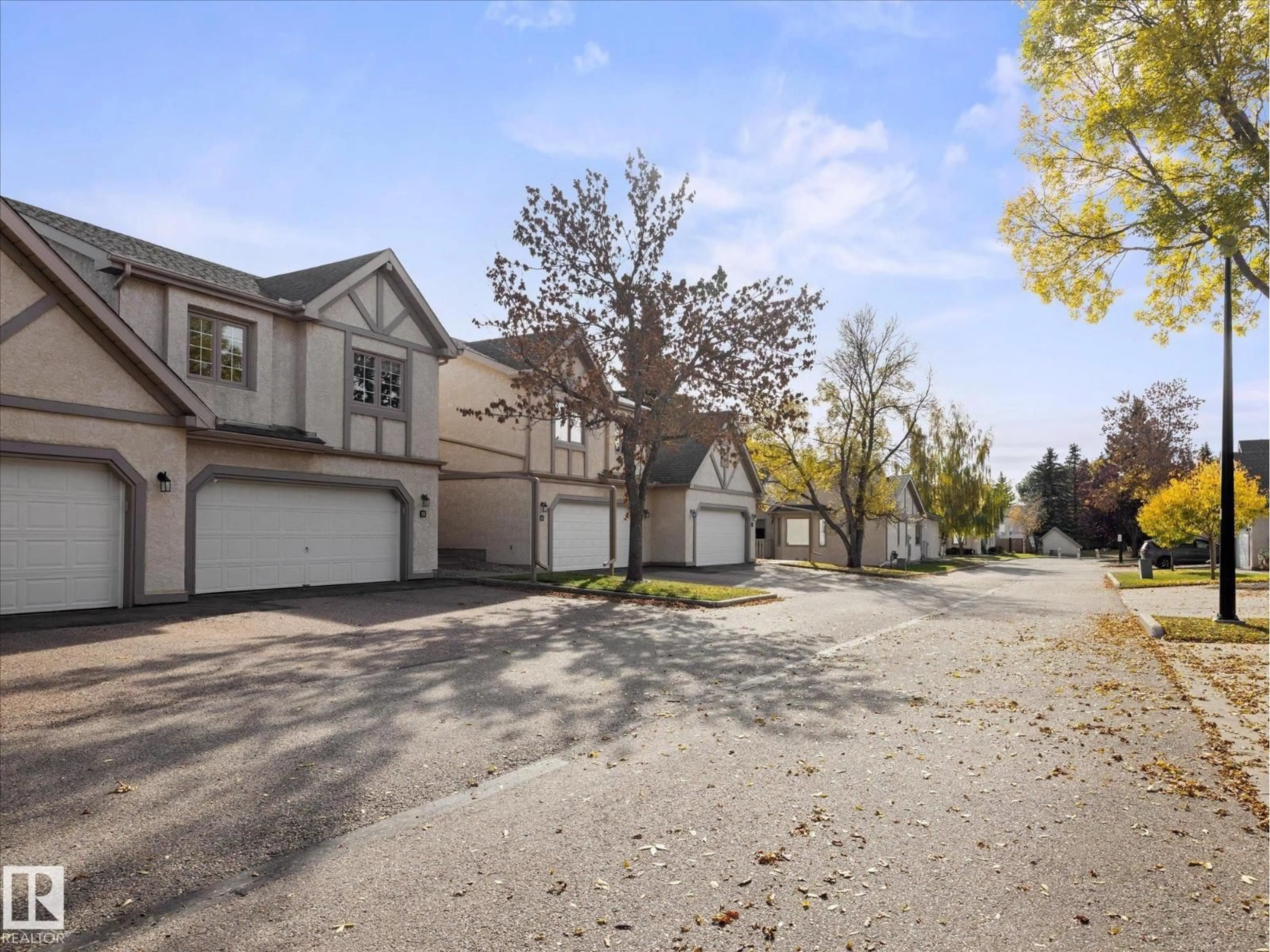 A pic from outside/outdoor area/front of a property/back of a property/a pic from drone, street for 57A - 18 ERIN RIDGE DR, St. Albert Alberta T8N6G1