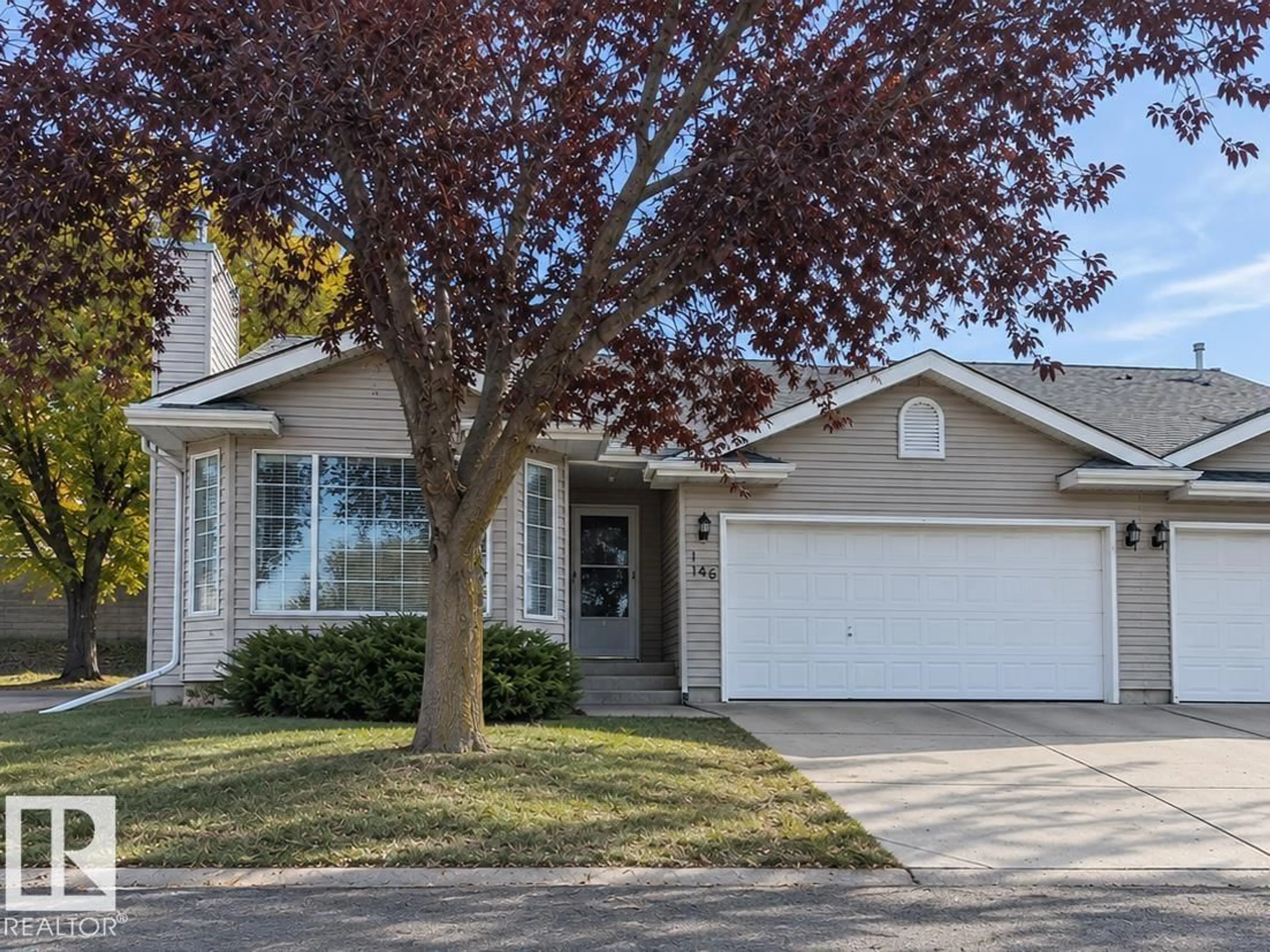 Home with vinyl exterior material, street for 20 - 25 DEERBOURNE DR, St. Albert Alberta T8N6E1