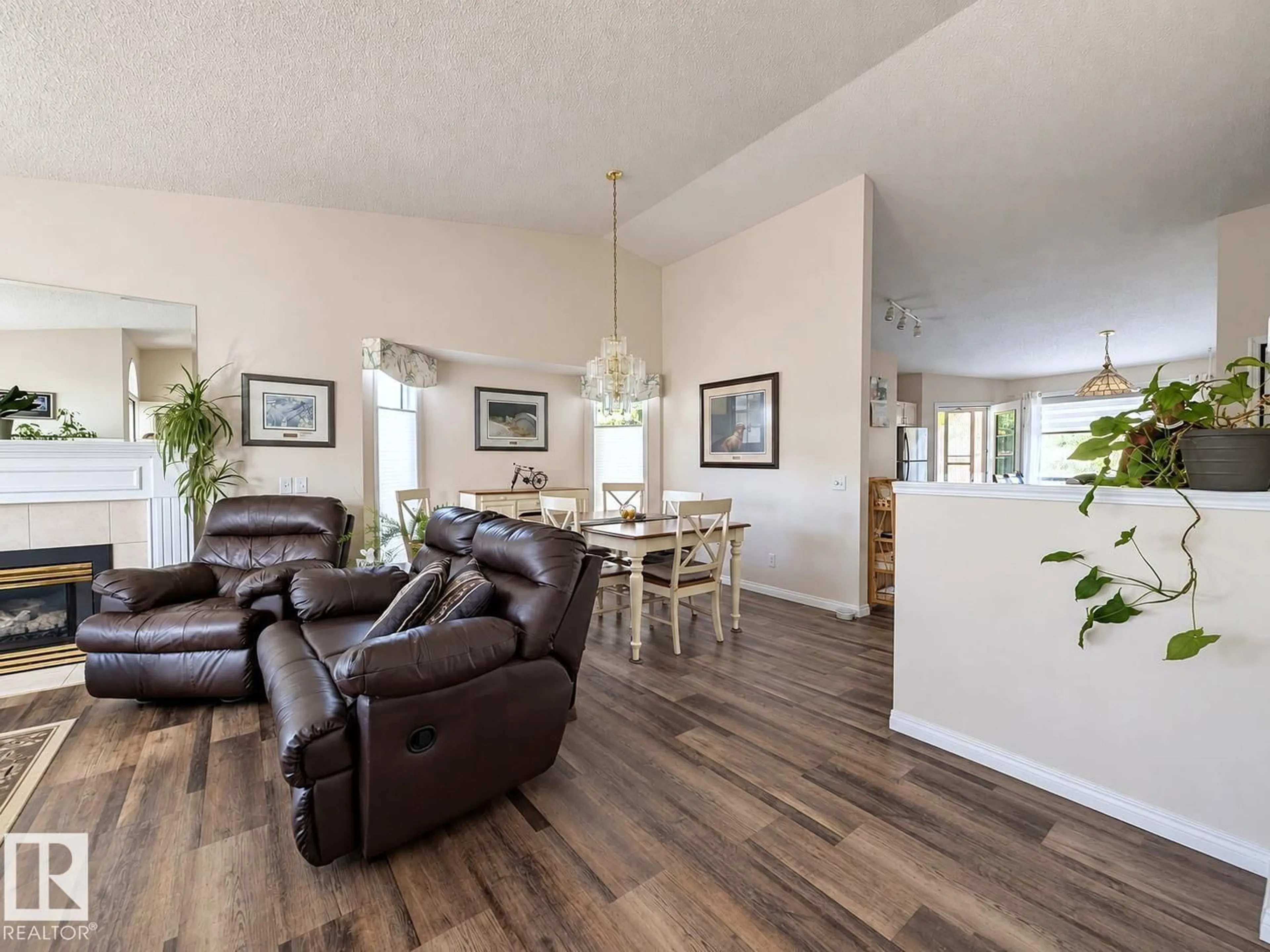 Living room with furniture, wood/laminate floor for 20 - 25 DEERBOURNE DR, St. Albert Alberta T8N6E1