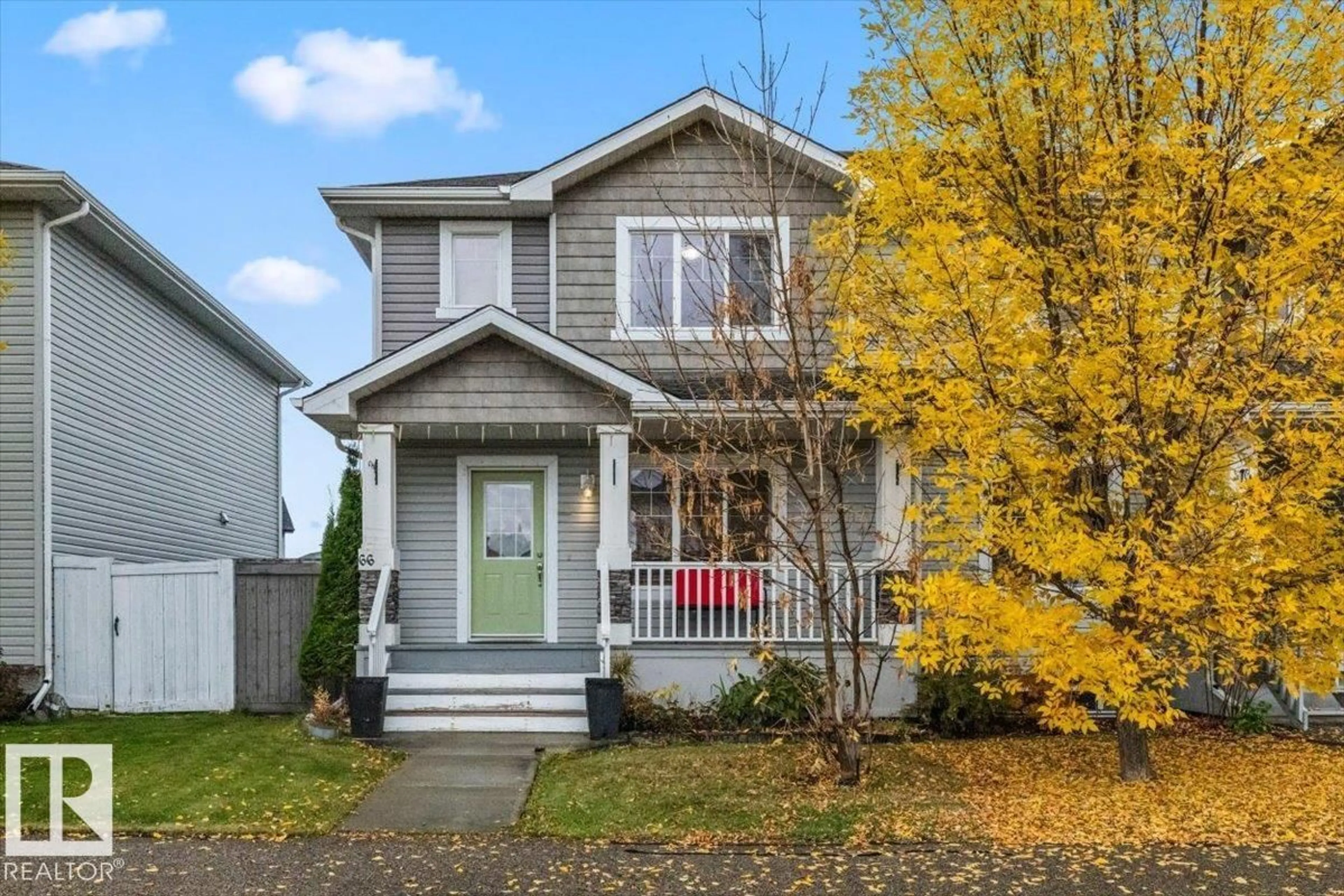 Home with vinyl exterior material, street for 66 ALLARD WY, Fort Saskatchewan Alberta T8L0E6