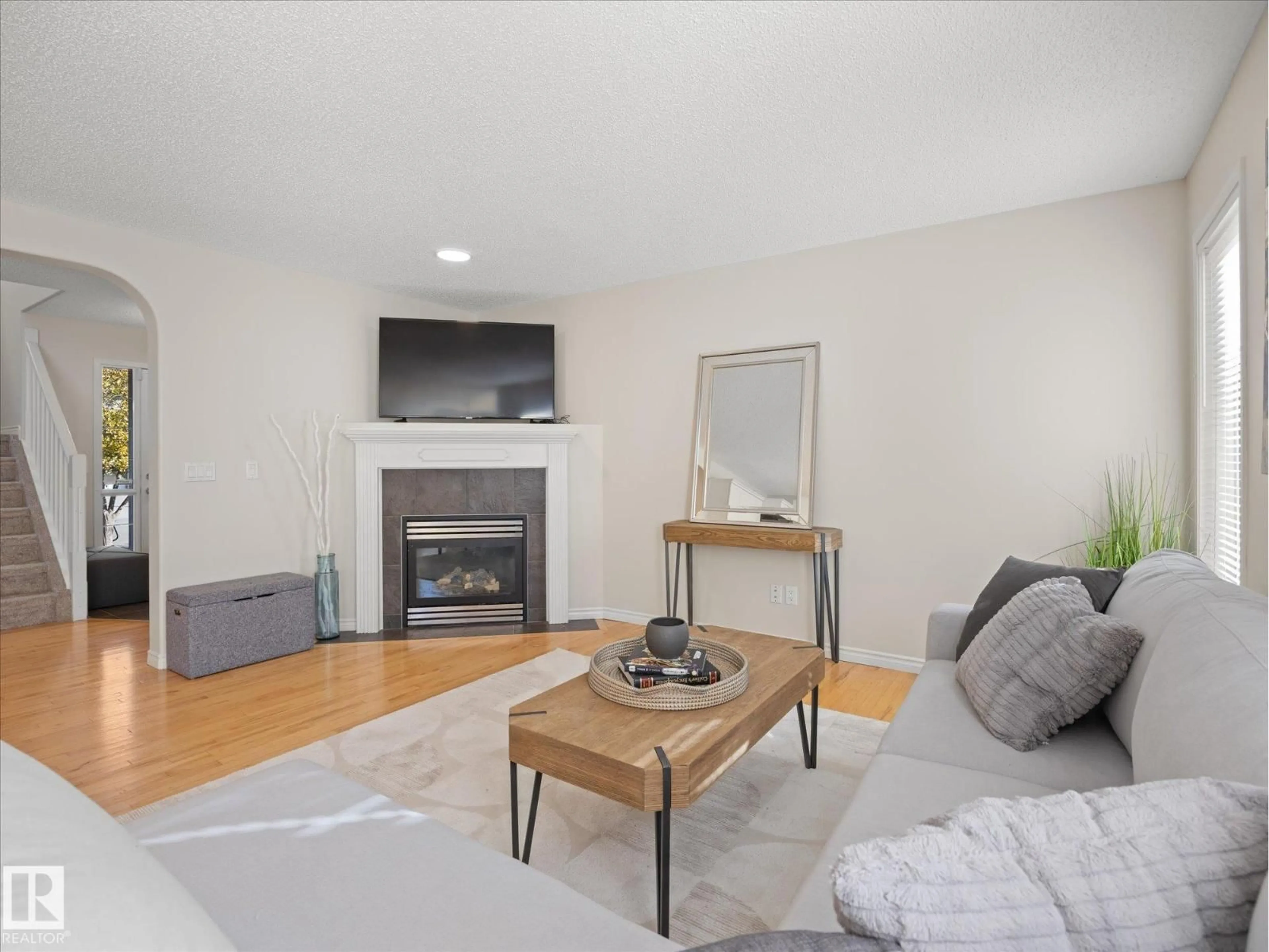 Living room with furniture, unknown for 11531 11 AV, Edmonton Alberta T6W1W7