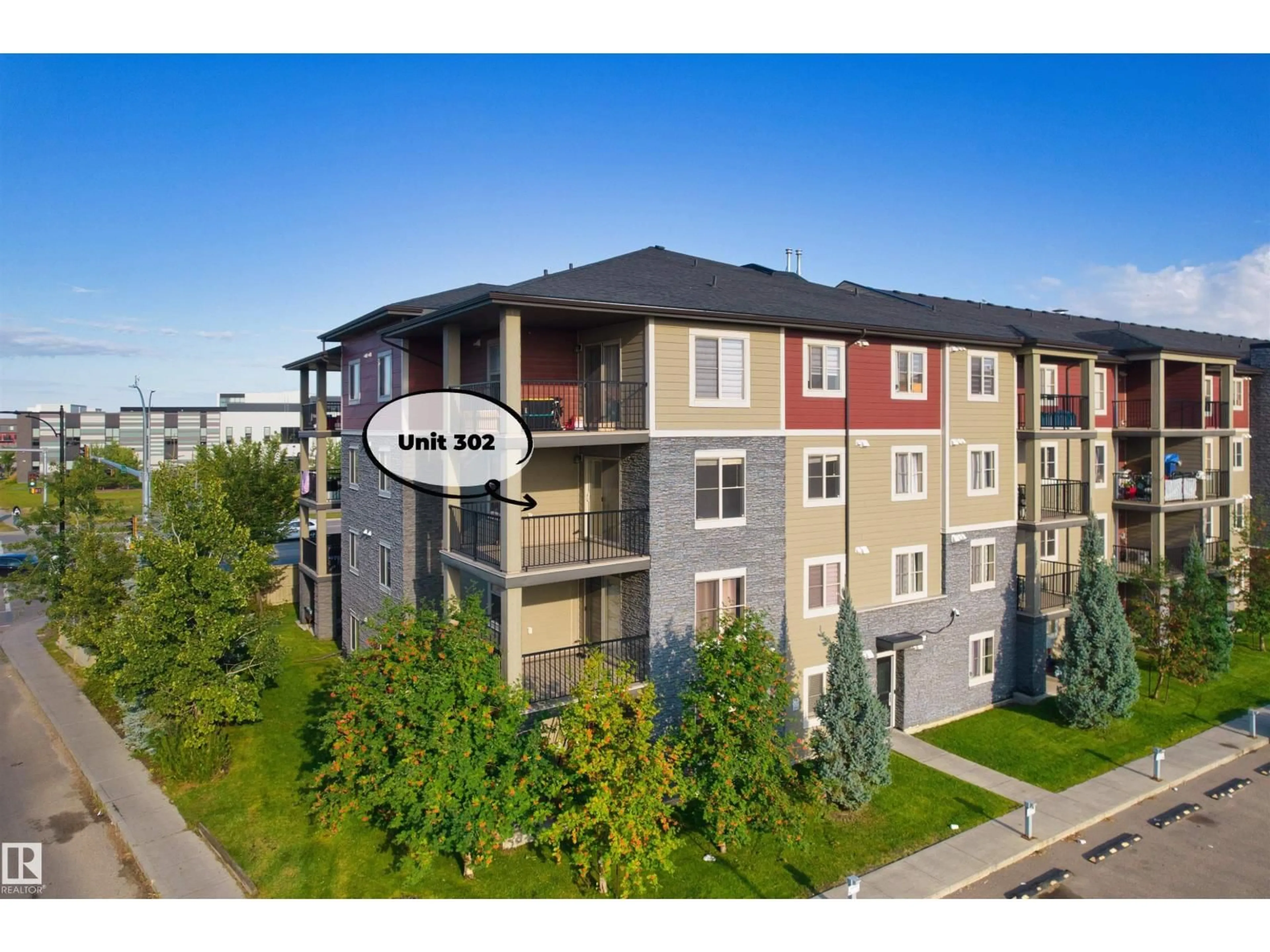 A pic from outside/outdoor area/front of a property/back of a property/a pic from drone, building for #302 - 3315 JAMES MOWATT TR, Edmonton Alberta T6W3L9