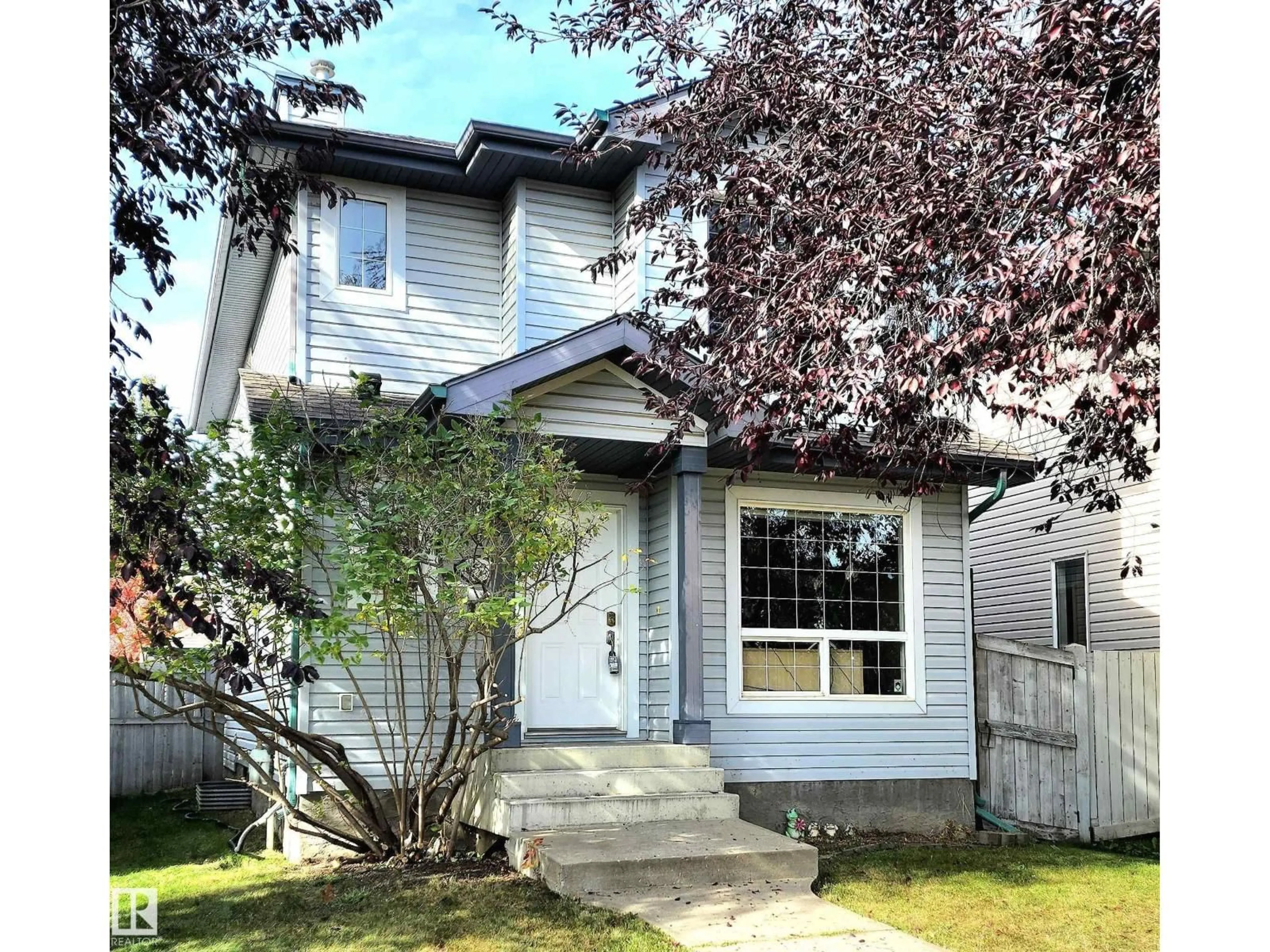 Home with vinyl exterior material, street for NW - 452 GIBB WD, Edmonton Alberta T5T6W7