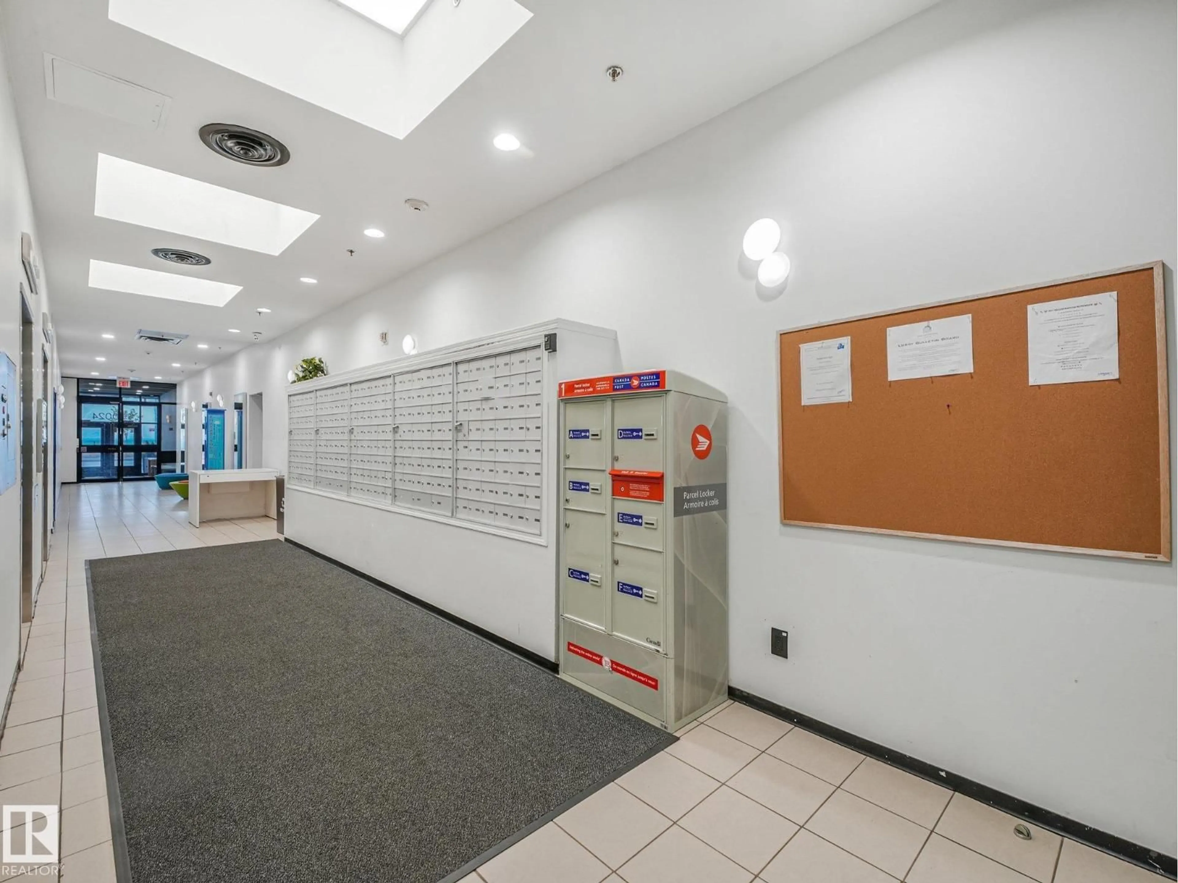Indoor foyer for #206 - 10024 JASPER AV, Edmonton Alberta T5J1R9