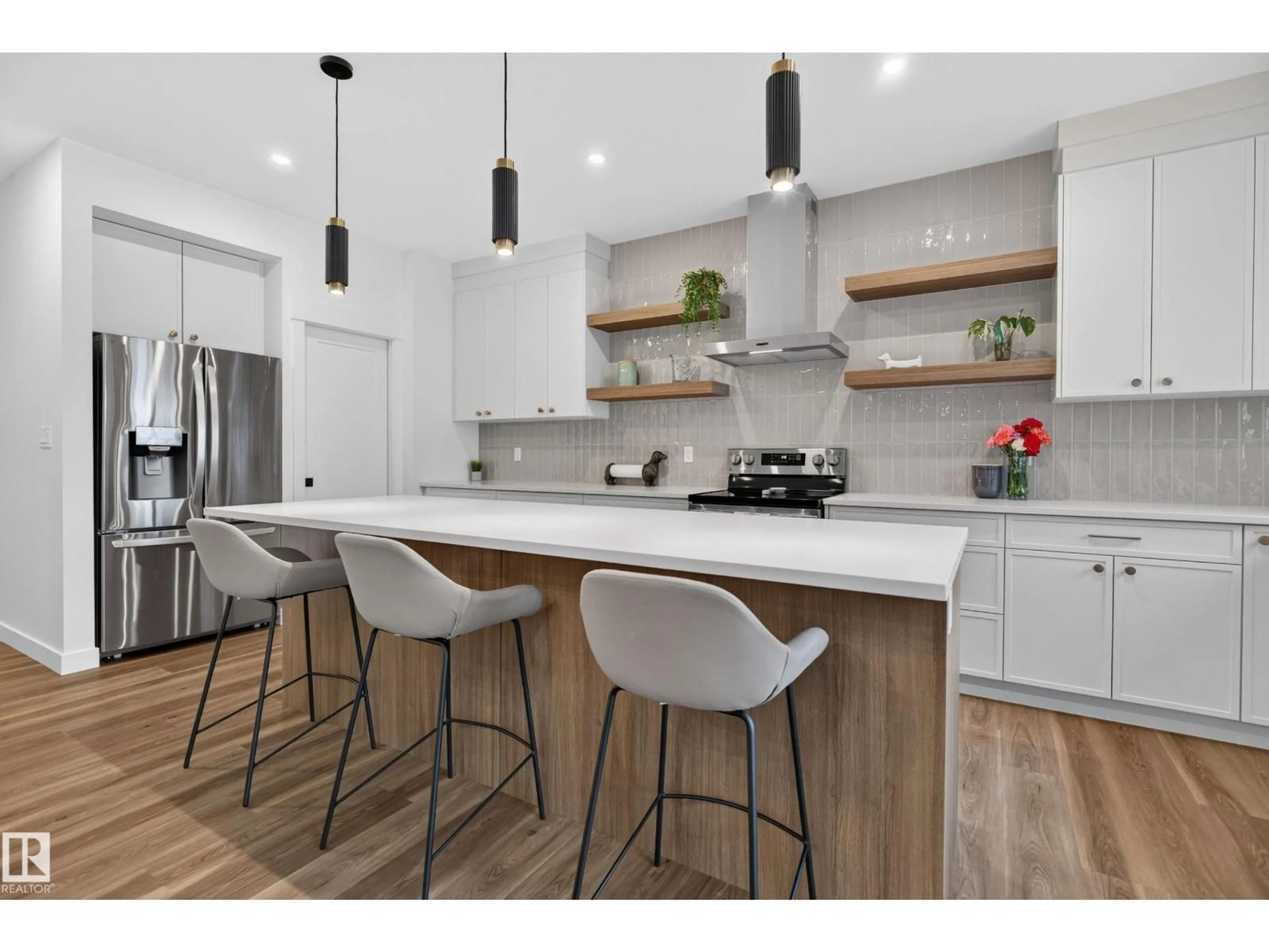 Open concept kitchen, wood/laminate floor for 66 GLADSTONE BN, Spruce Grove Alberta T7X0Z6