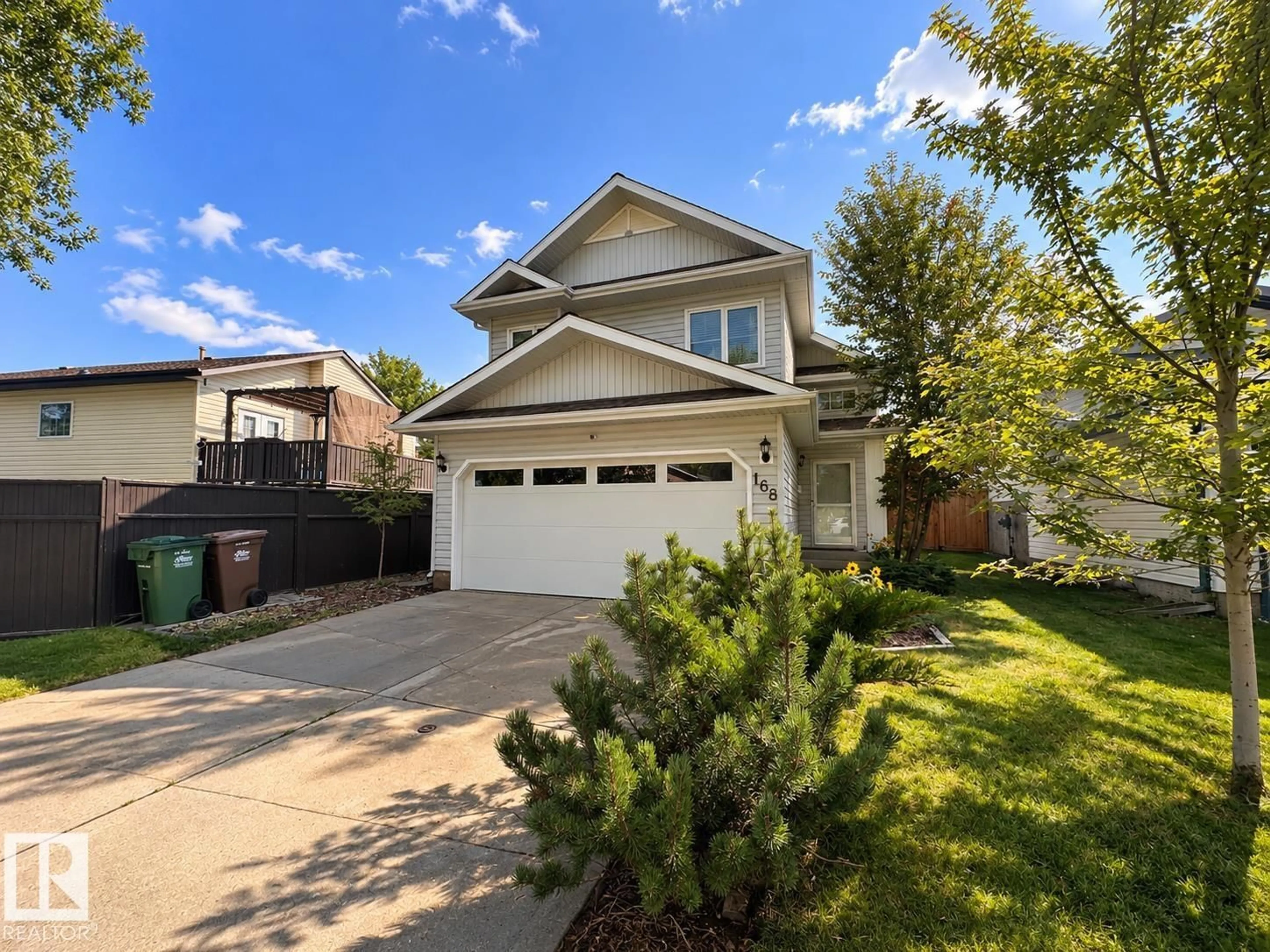 Home with vinyl exterior material, street for 168 HERITAGE DR, St. Albert Alberta T8N6J7