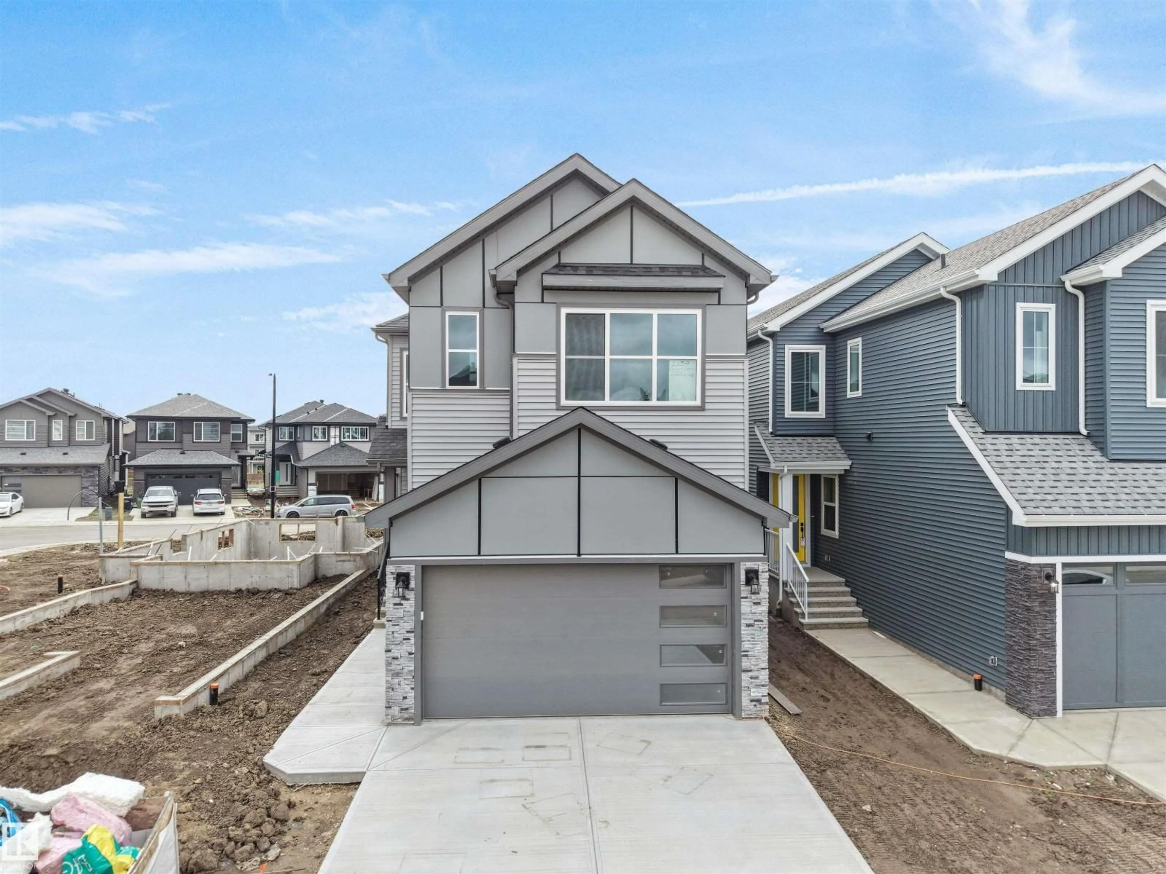 Home with vinyl exterior material, street for 2039 COLLIP CRESCENT, Edmonton Alberta T6W4W9