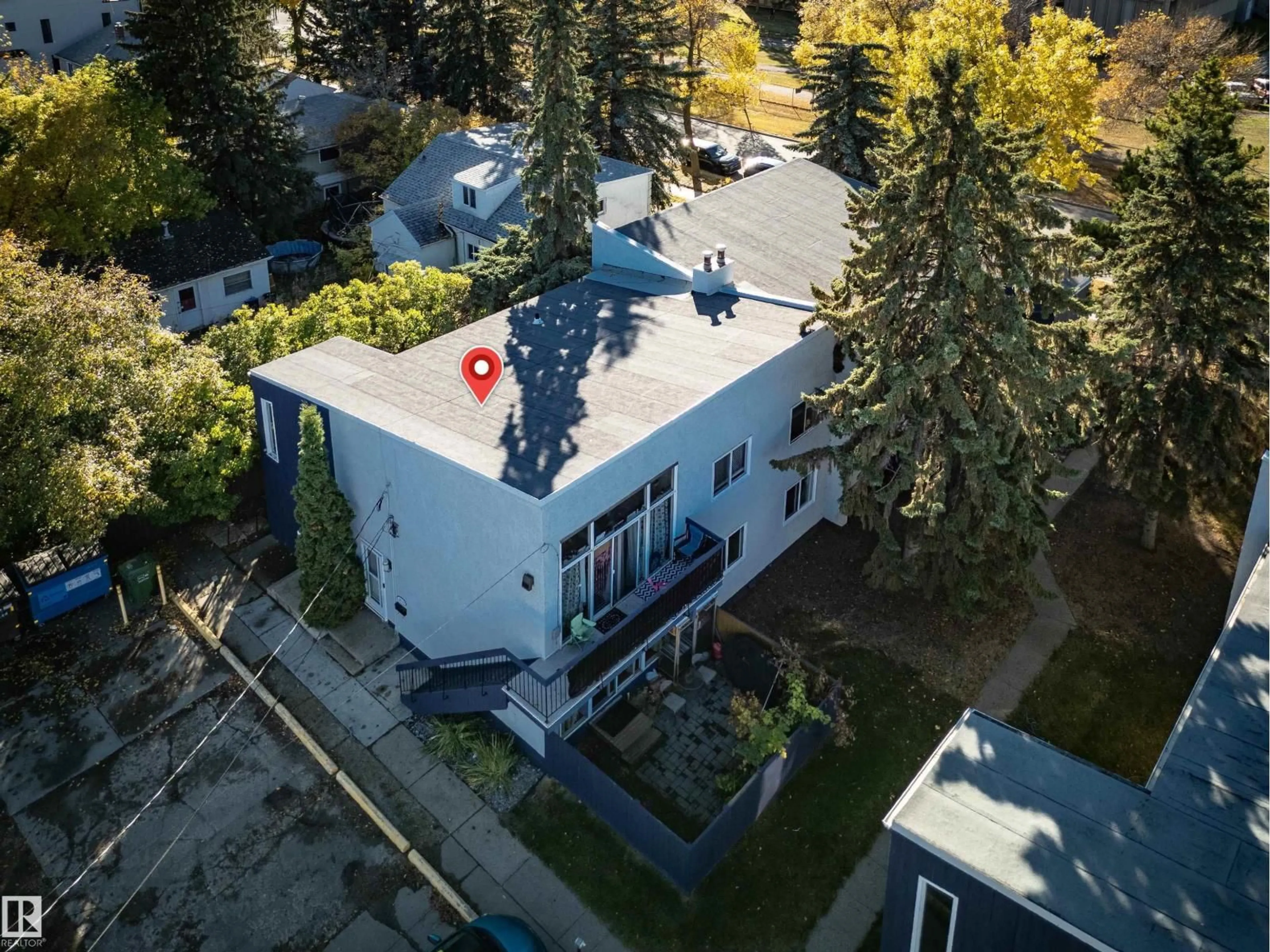 A pic from outside/outdoor area/front of a property/back of a property/a pic from drone, street for 10539 84 ST, Edmonton Alberta T6A3R4