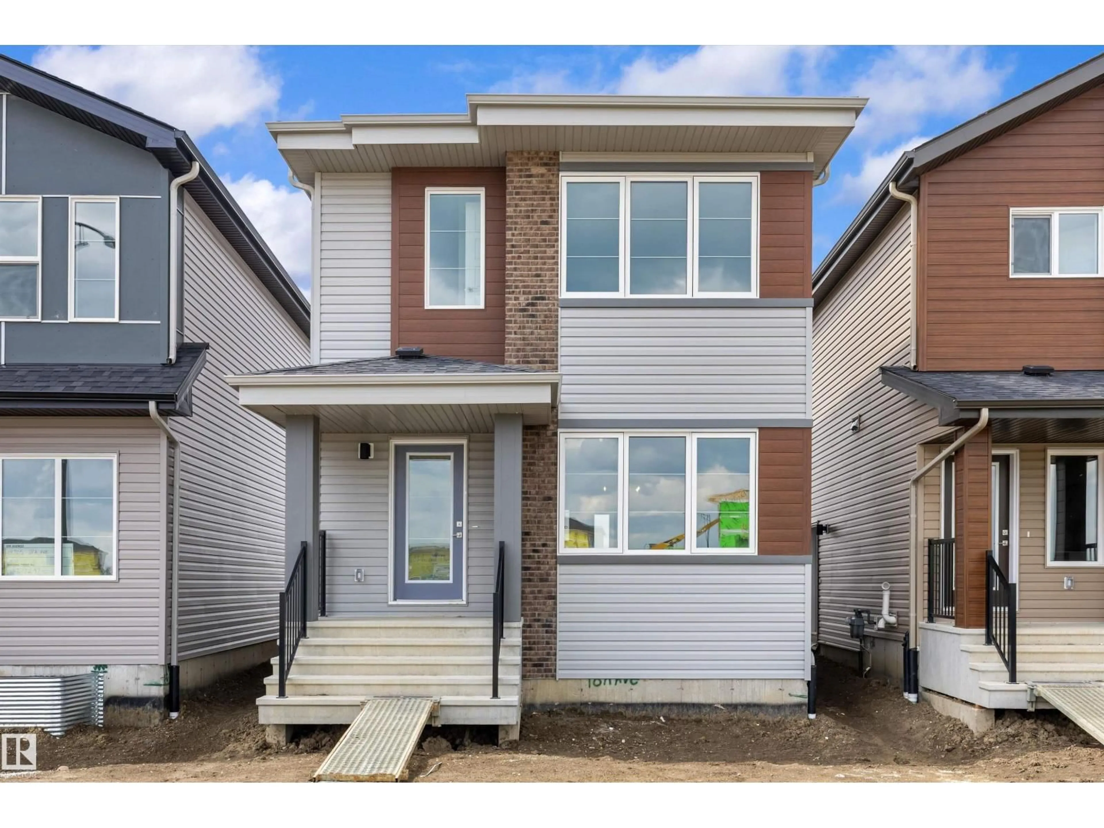 Home with vinyl exterior material, street for 18709 18A AV, Edmonton Alberta T6N0B2