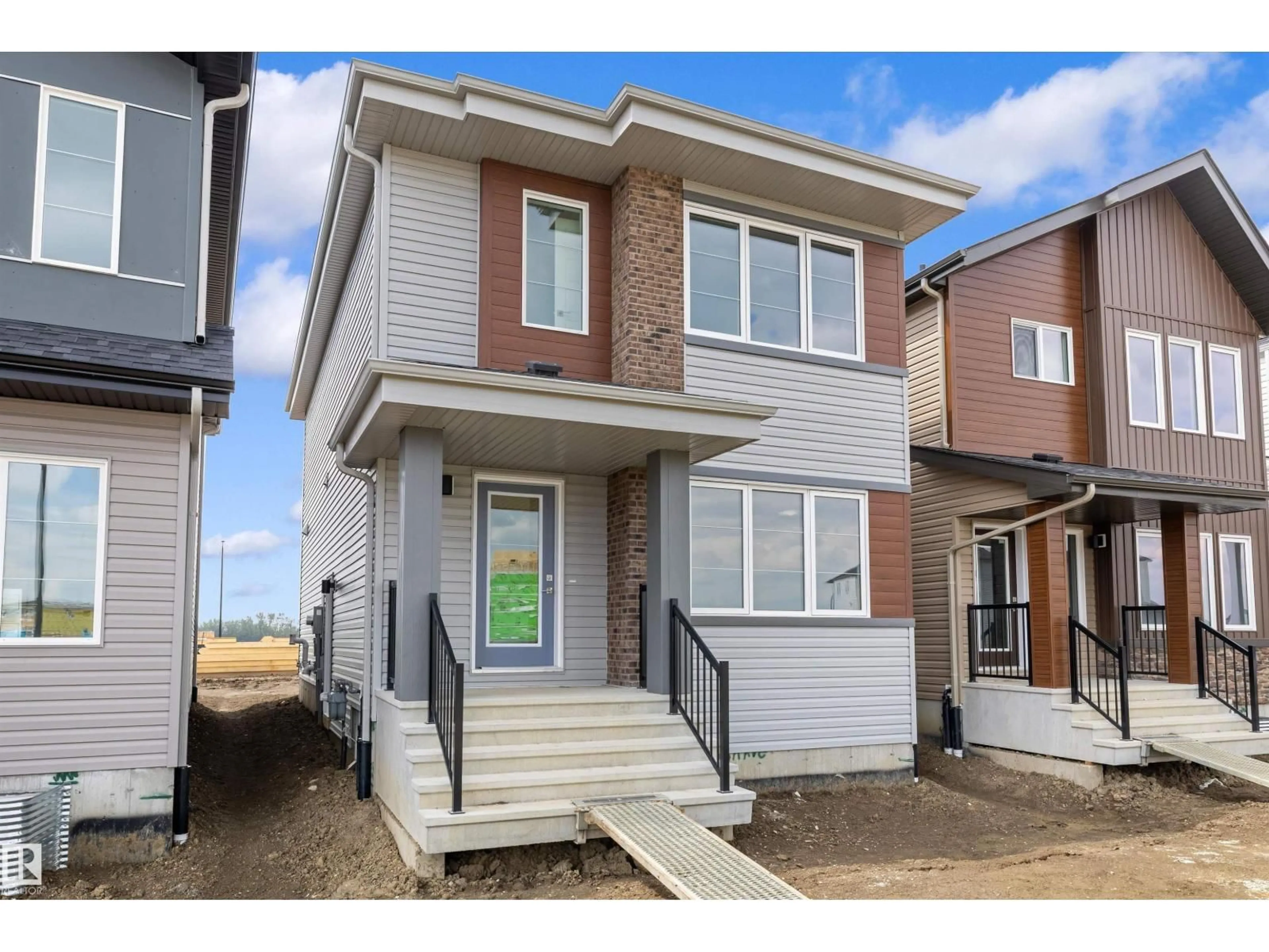Home with brick exterior material, street for 18709 18A AV, Edmonton Alberta T6N0B2