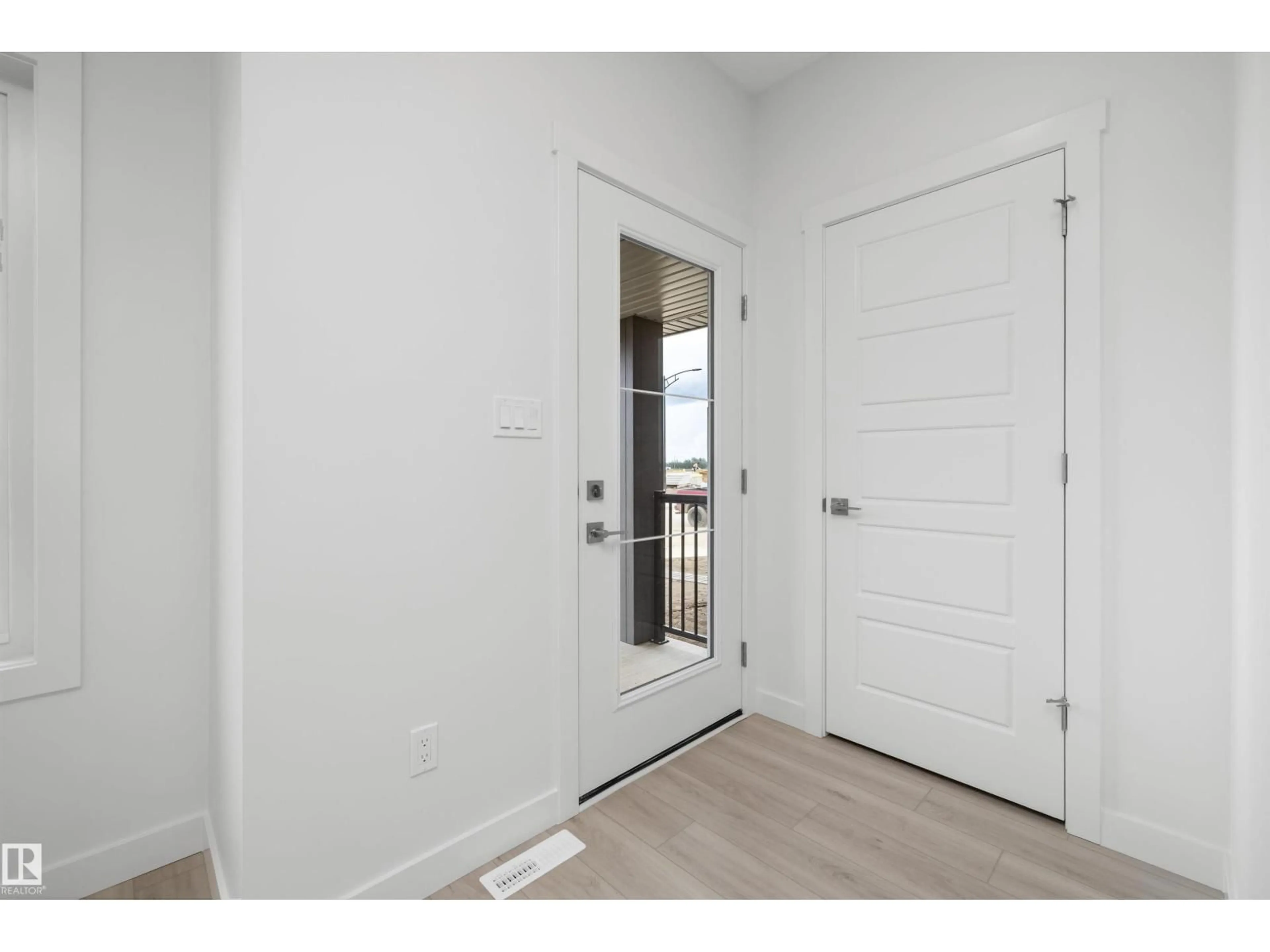 Indoor entryway for 18709 18A AV, Edmonton Alberta T6N0B2