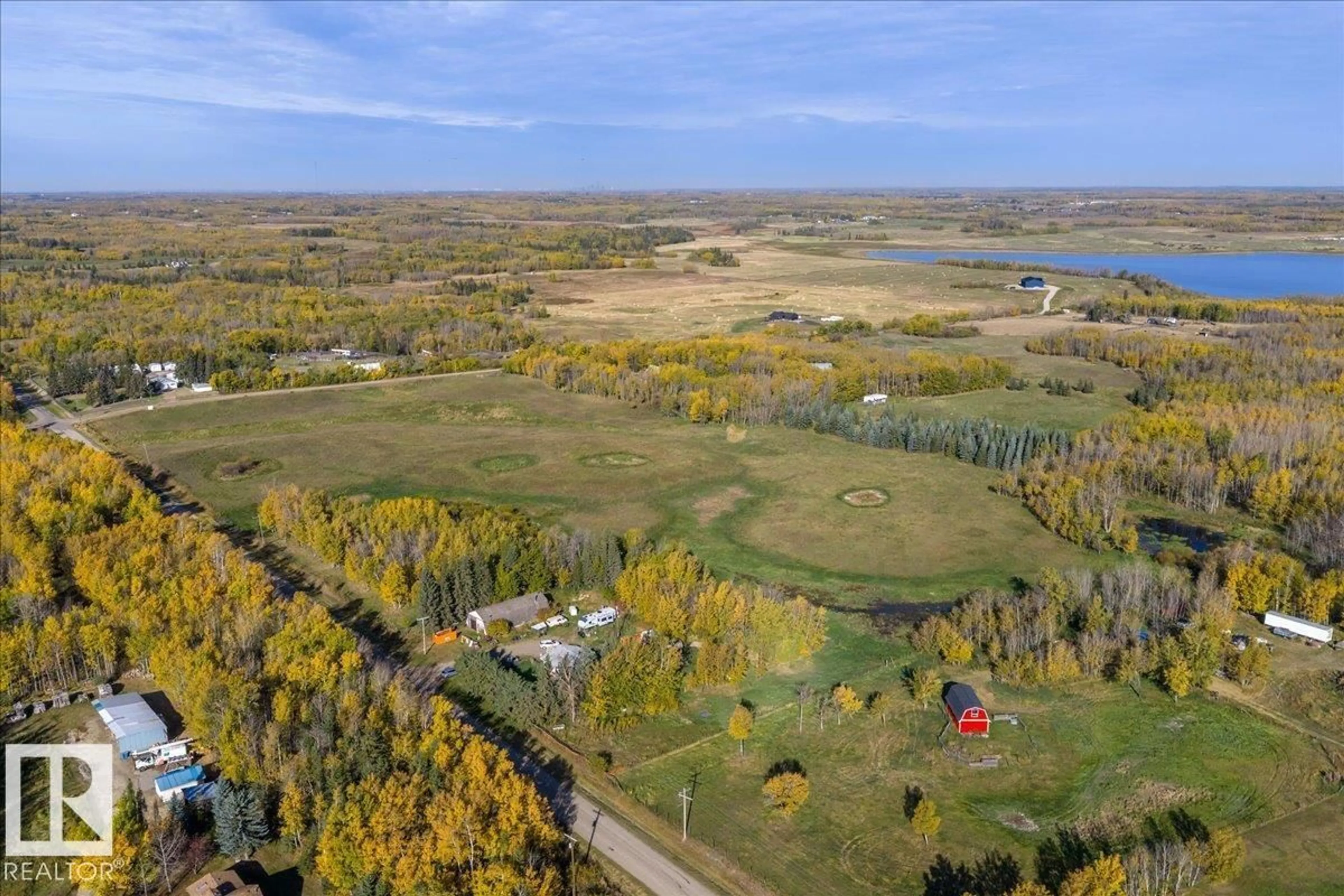 A pic from outside/outdoor area/front of a property/back of a property/a pic from drone, water/lake/river/ocean view for 22164 TWP ROAD 512, Rural Strathcona County Alberta T8G1E8