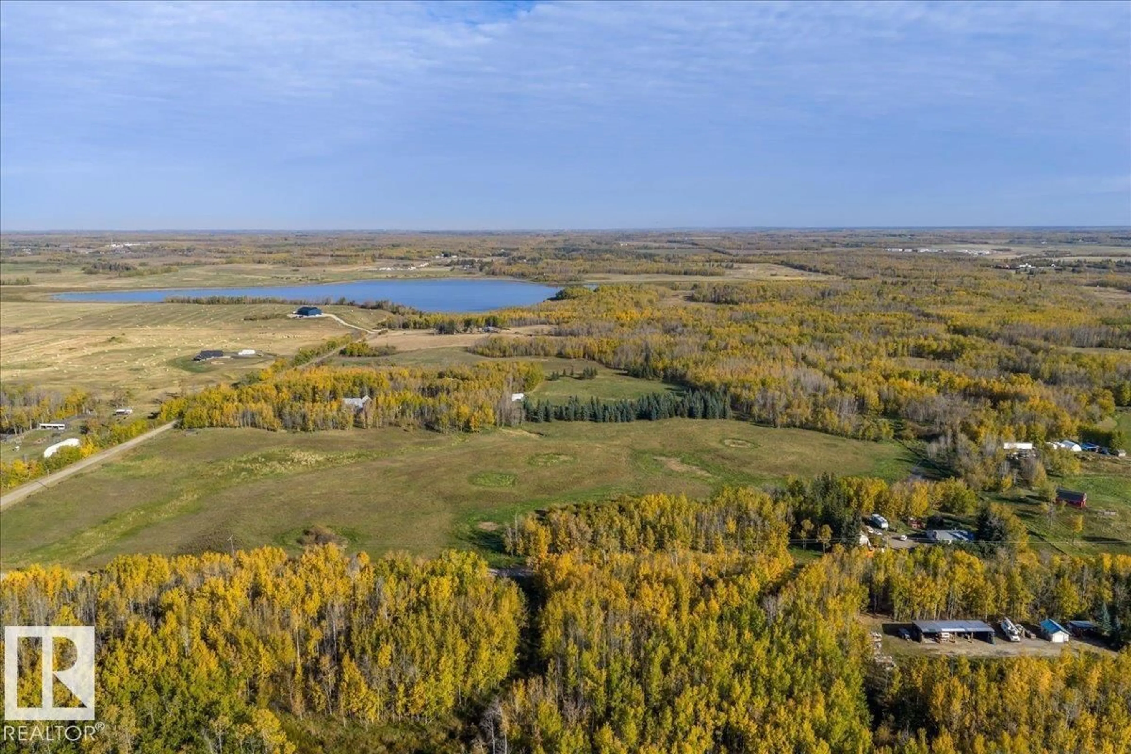 A pic from outside/outdoor area/front of a property/back of a property/a pic from drone, water/lake/river/ocean view for 22164 TWP ROAD 512, Rural Strathcona County Alberta T8G1E8