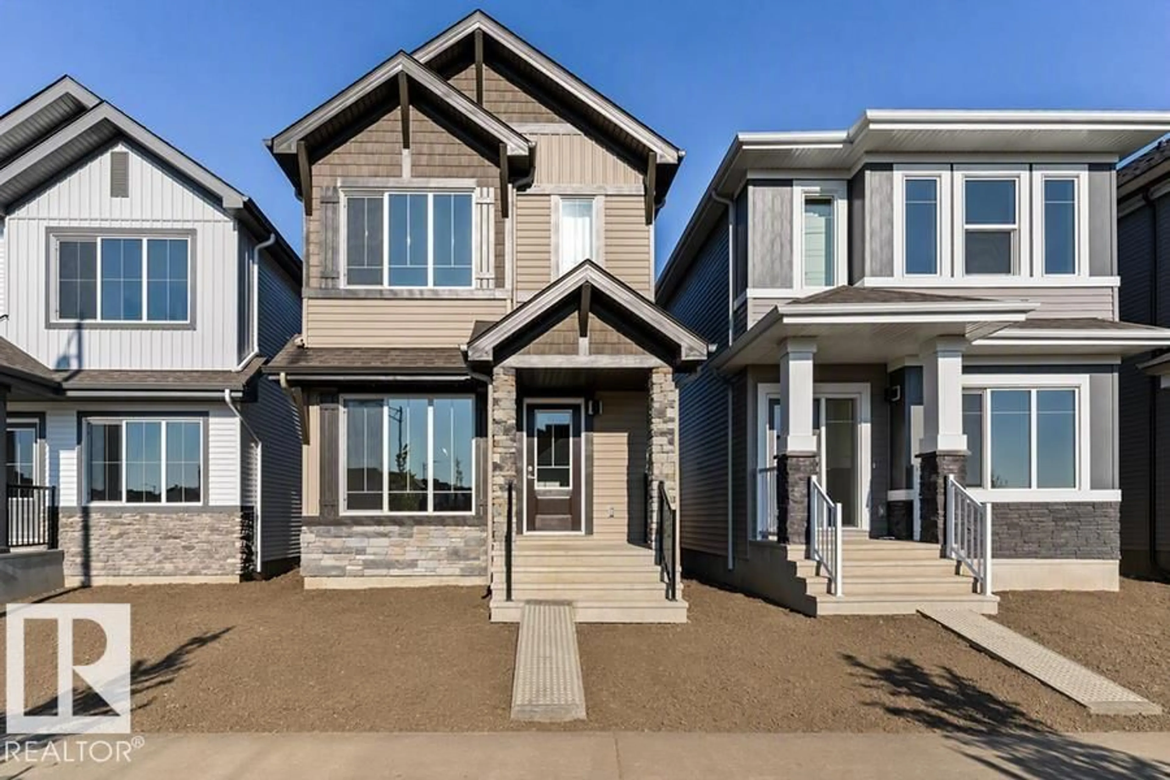 Home with vinyl exterior material, street for NW - 1609 210A ST, Edmonton Alberta T6M3E1