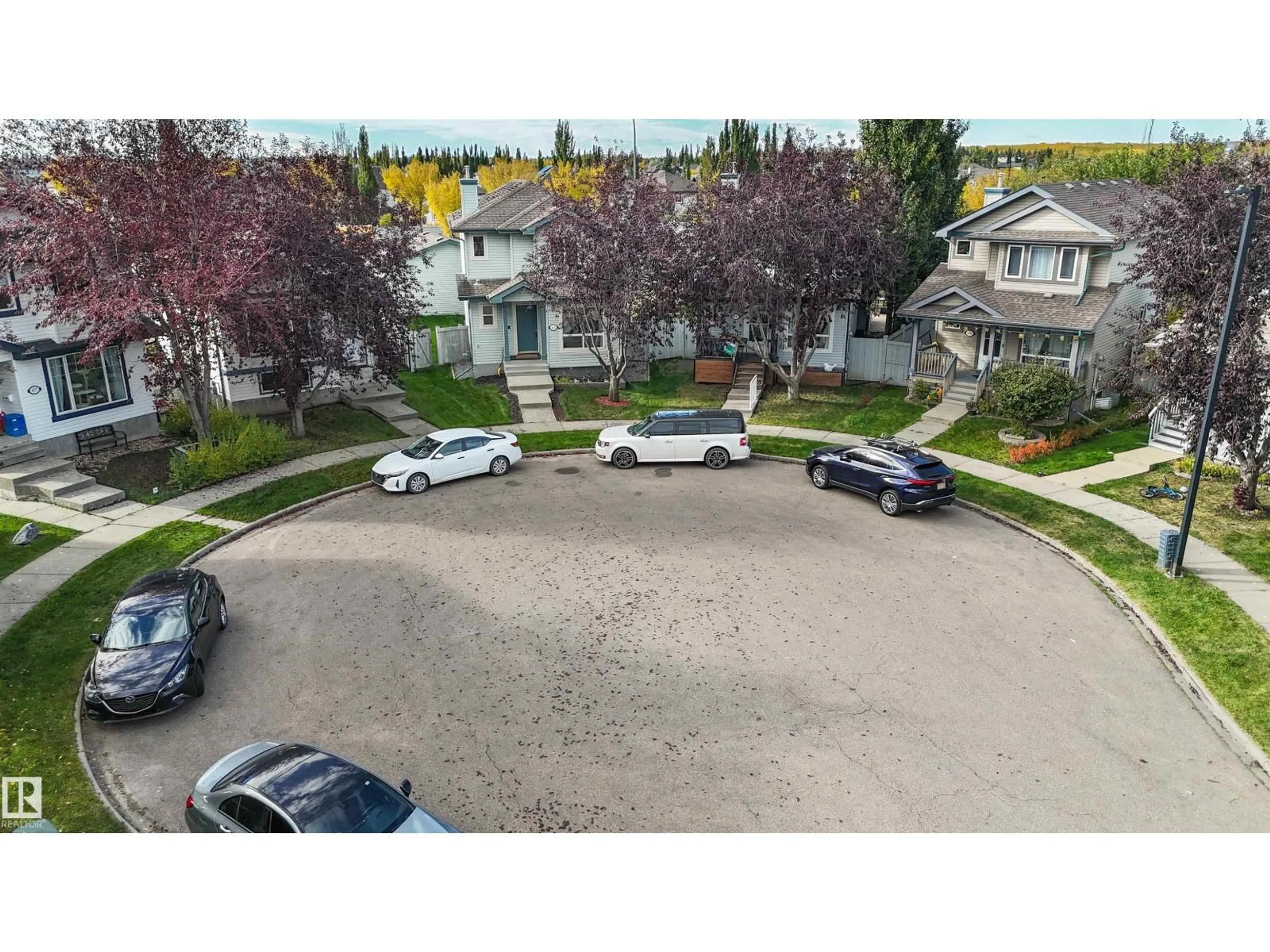 A pic from outside/outdoor area/front of a property/back of a property/a pic from drone, street for NW - 460 GIBB WD, Edmonton Alberta T5T6W7