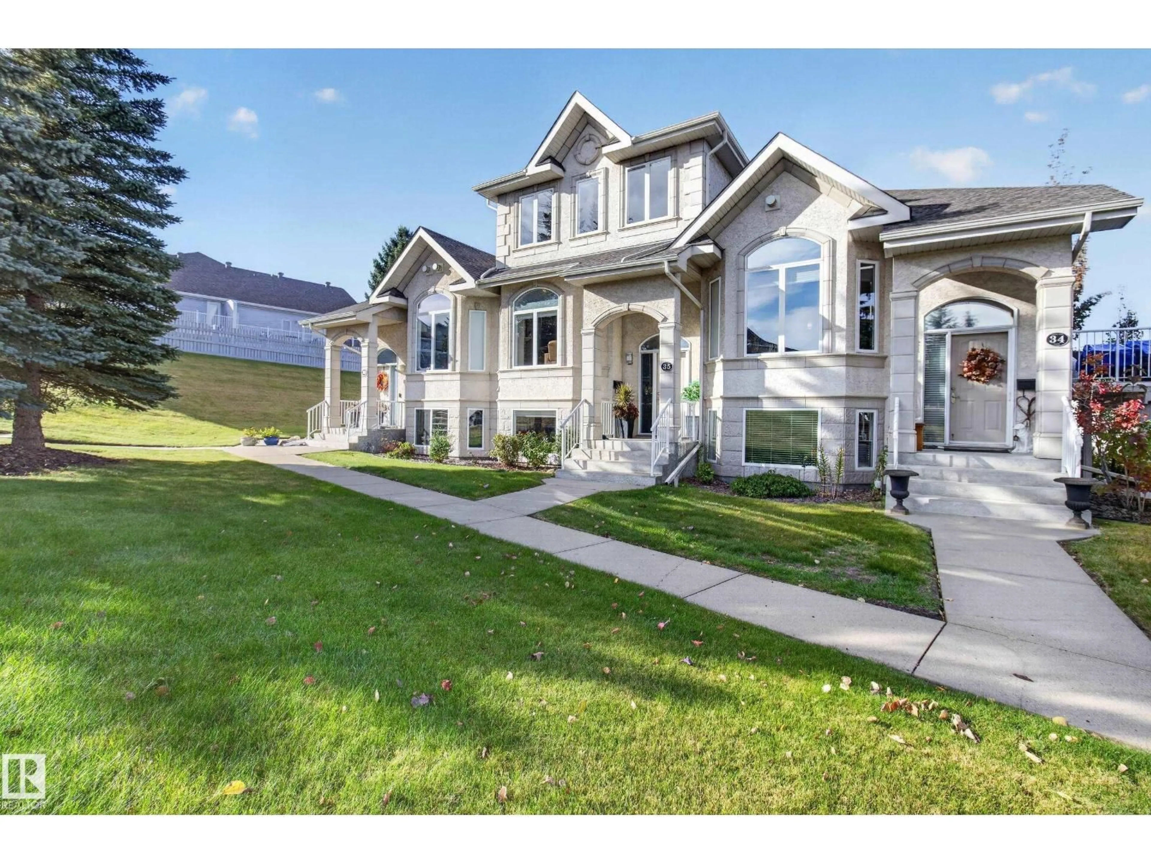 Home with vinyl exterior material, street for 35 101 JIM COMMON DR, Sherwood Park Alberta T8H2M1