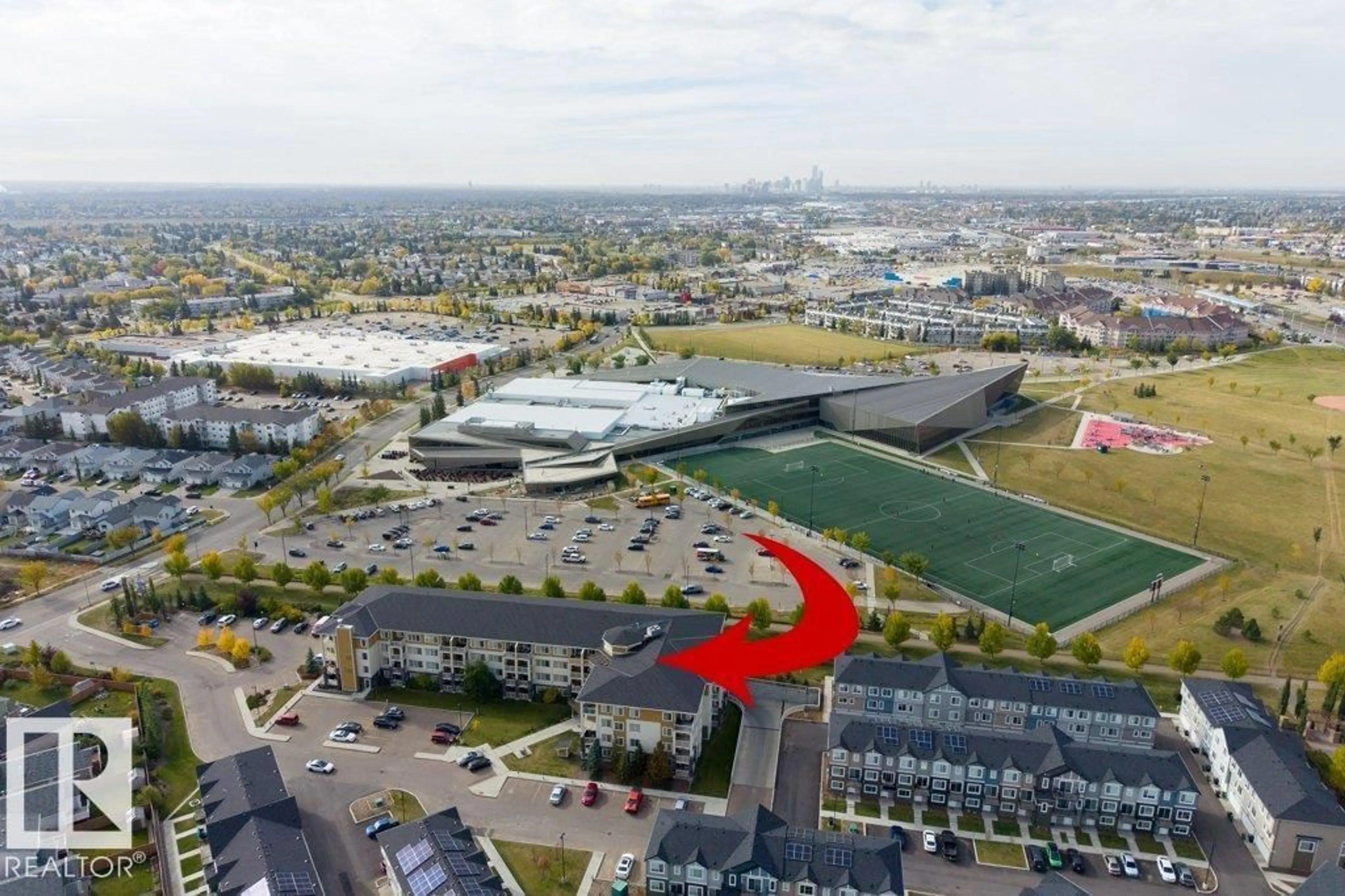 A pic from outside/outdoor area/front of a property/back of a property/a pic from drone, unknown for #408 - 3670 139 AV, Edmonton Alberta T5Y3N5