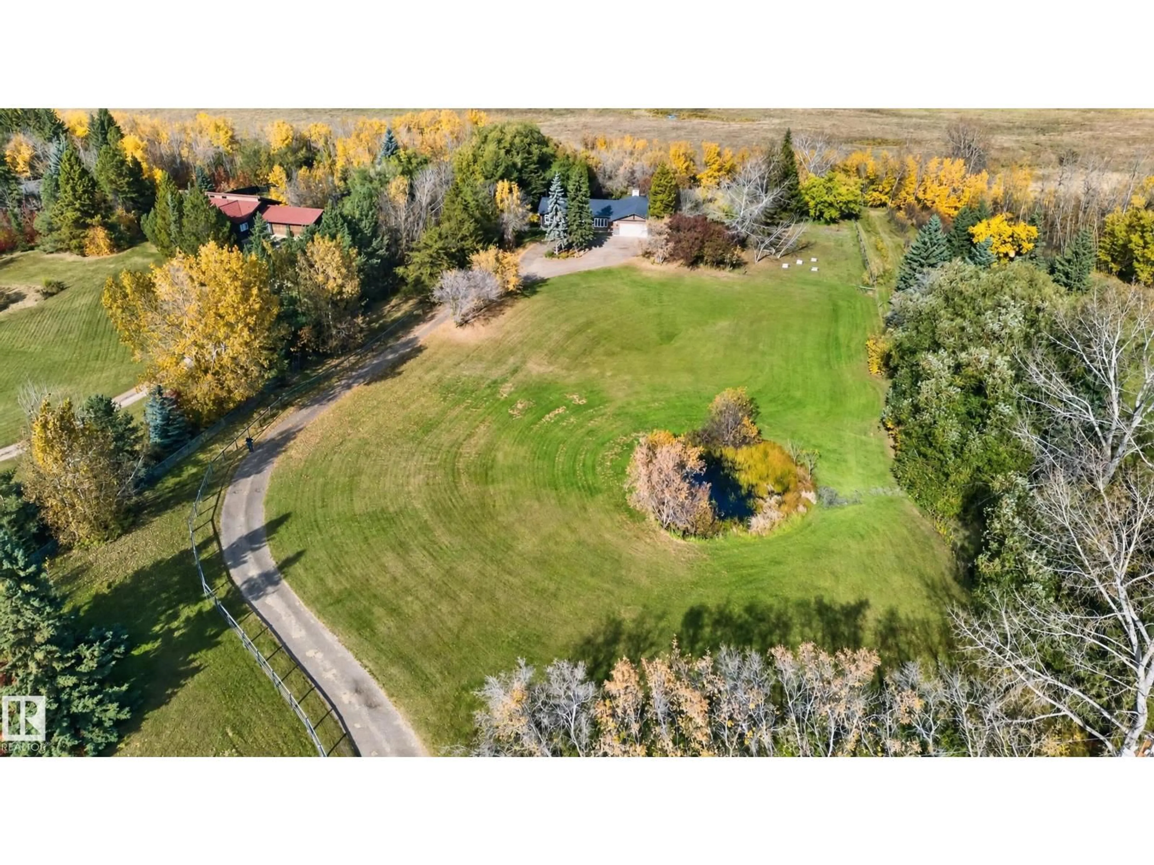 A pic from outside/outdoor area/front of a property/back of a property/a pic from drone, unknown for 26 - 52472 RGE ROAD 224, Rural Strathcona County Alberta T8A4R6