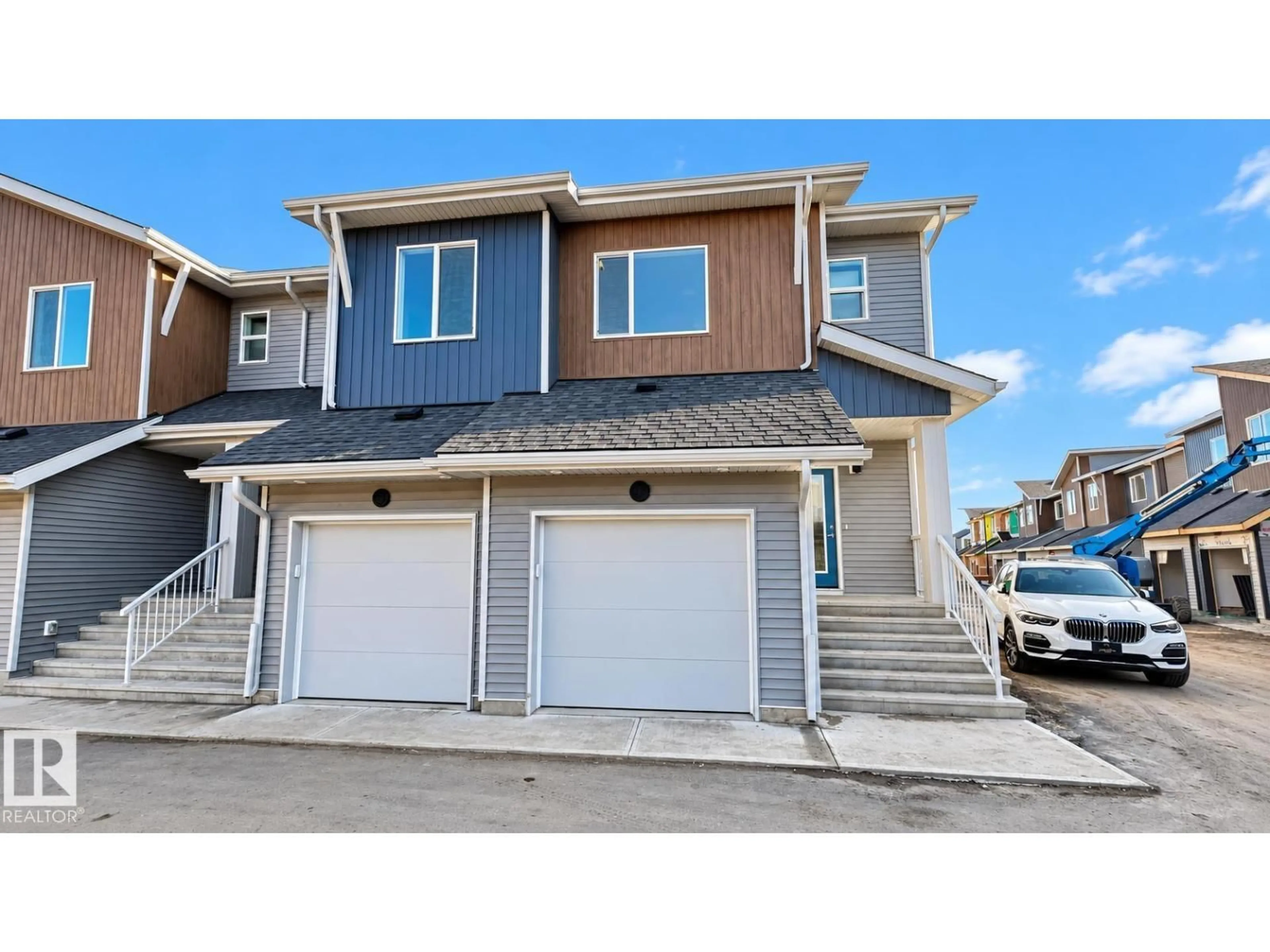 Home with vinyl exterior material, street for 710 - 53 MATTSON SW, Edmonton Alberta T6X3H8