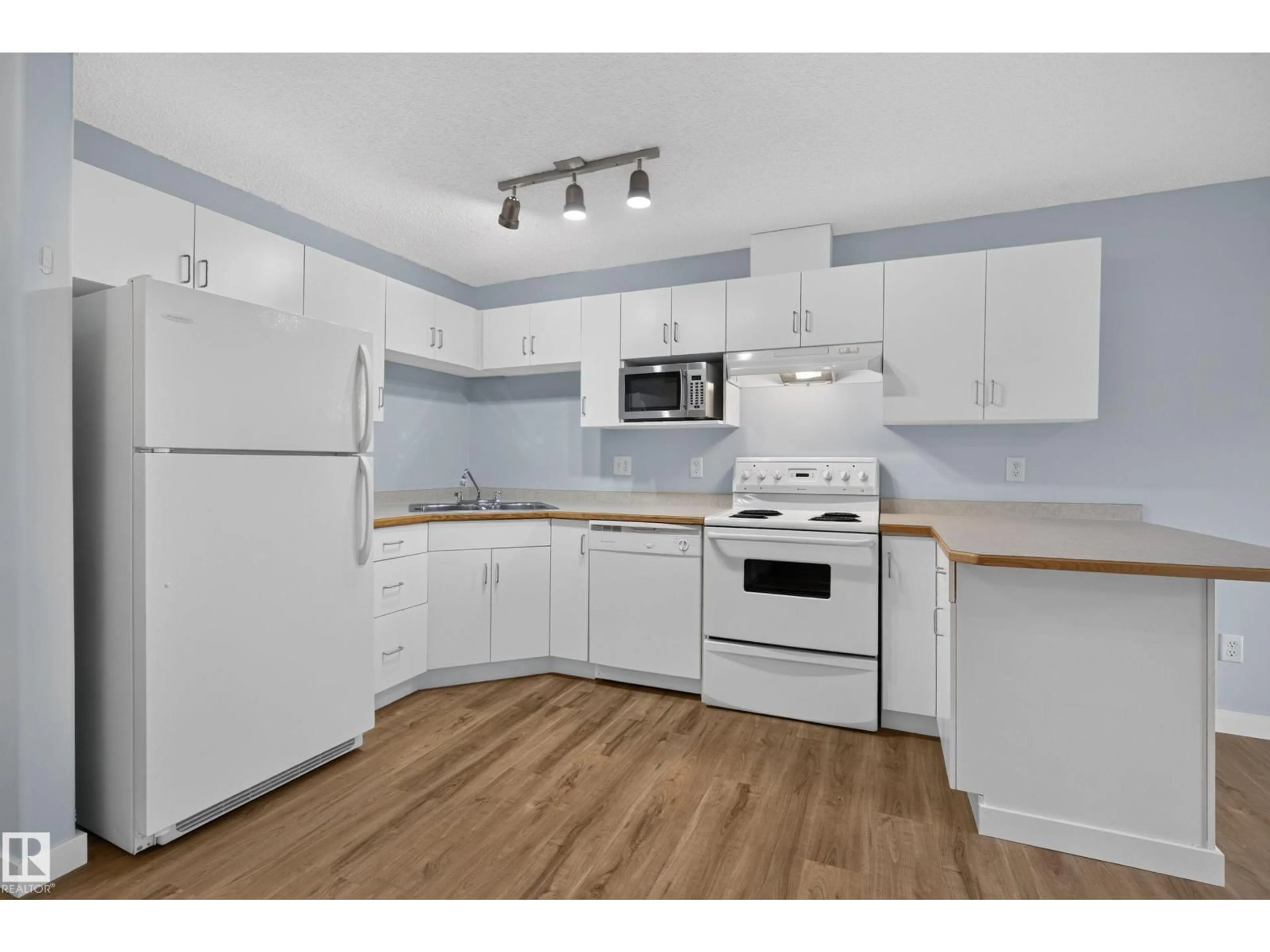 Standard kitchen, wood/laminate floor for #118 - 10535 122 ST NW, Edmonton Alberta T5N4B7