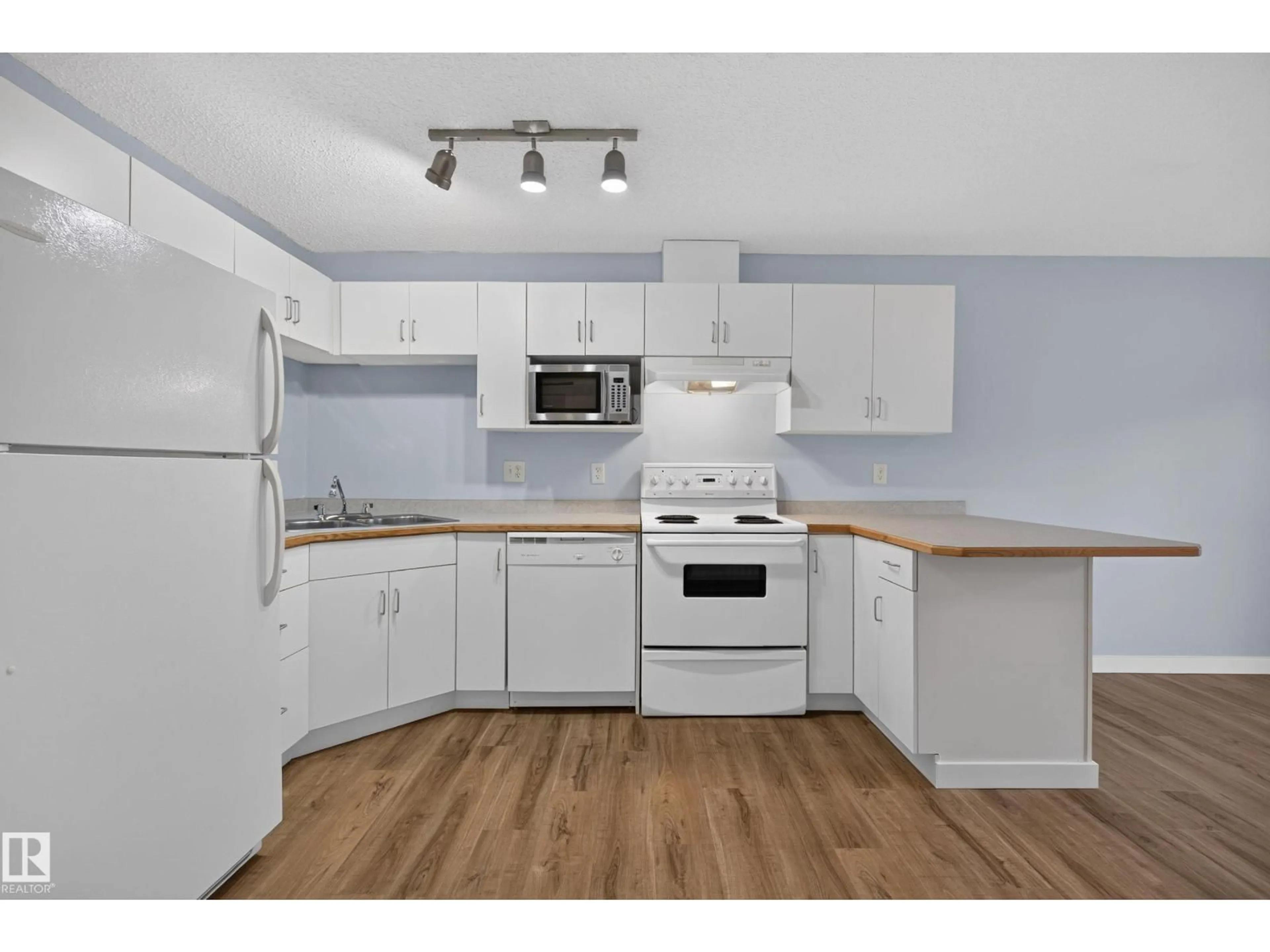 Standard kitchen, wood/laminate floor for #118 - 10535 122 ST NW, Edmonton Alberta T5N4B7